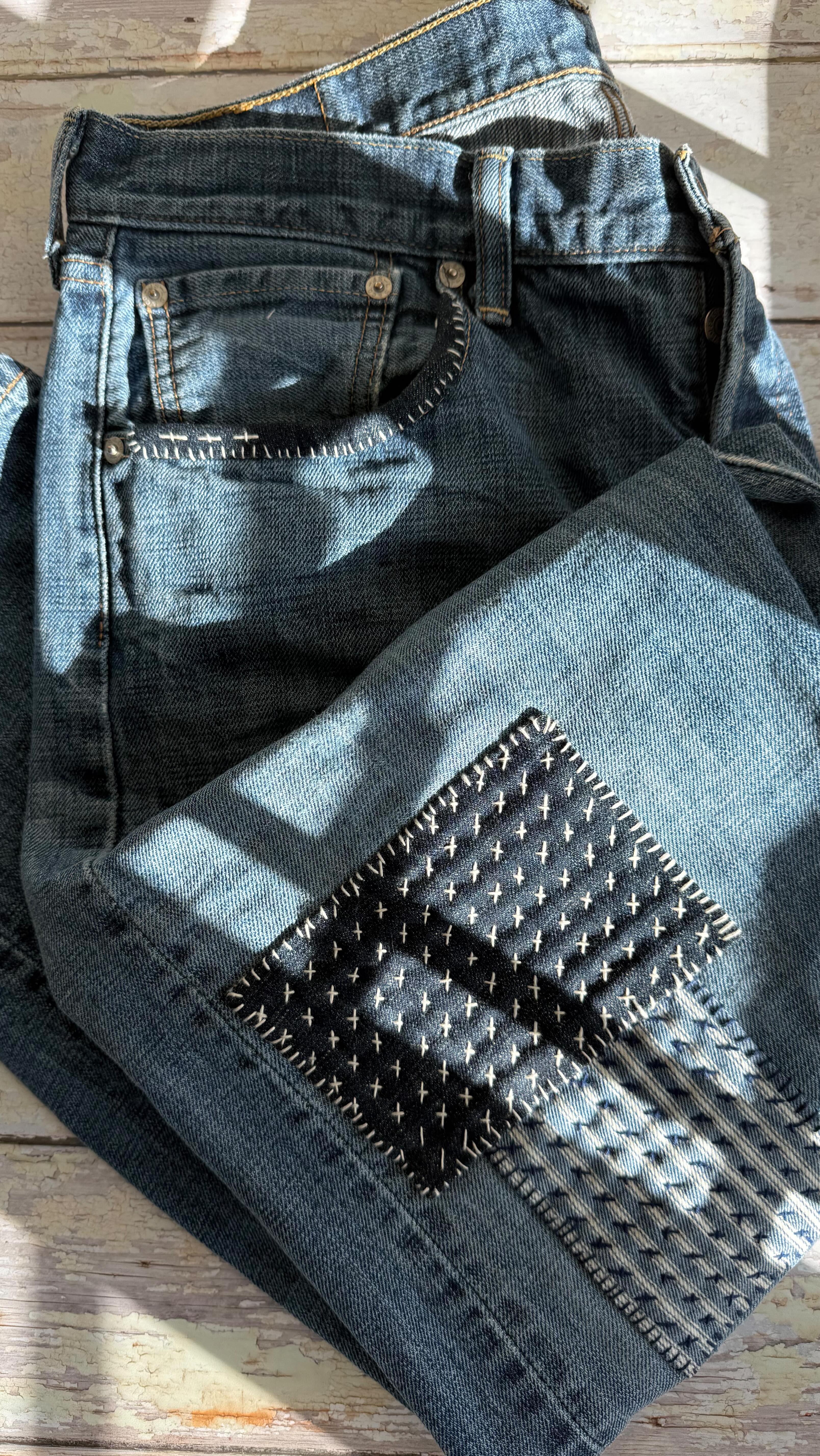 Hours later…. these vintage denim Levi’s are fully repaired. In ...