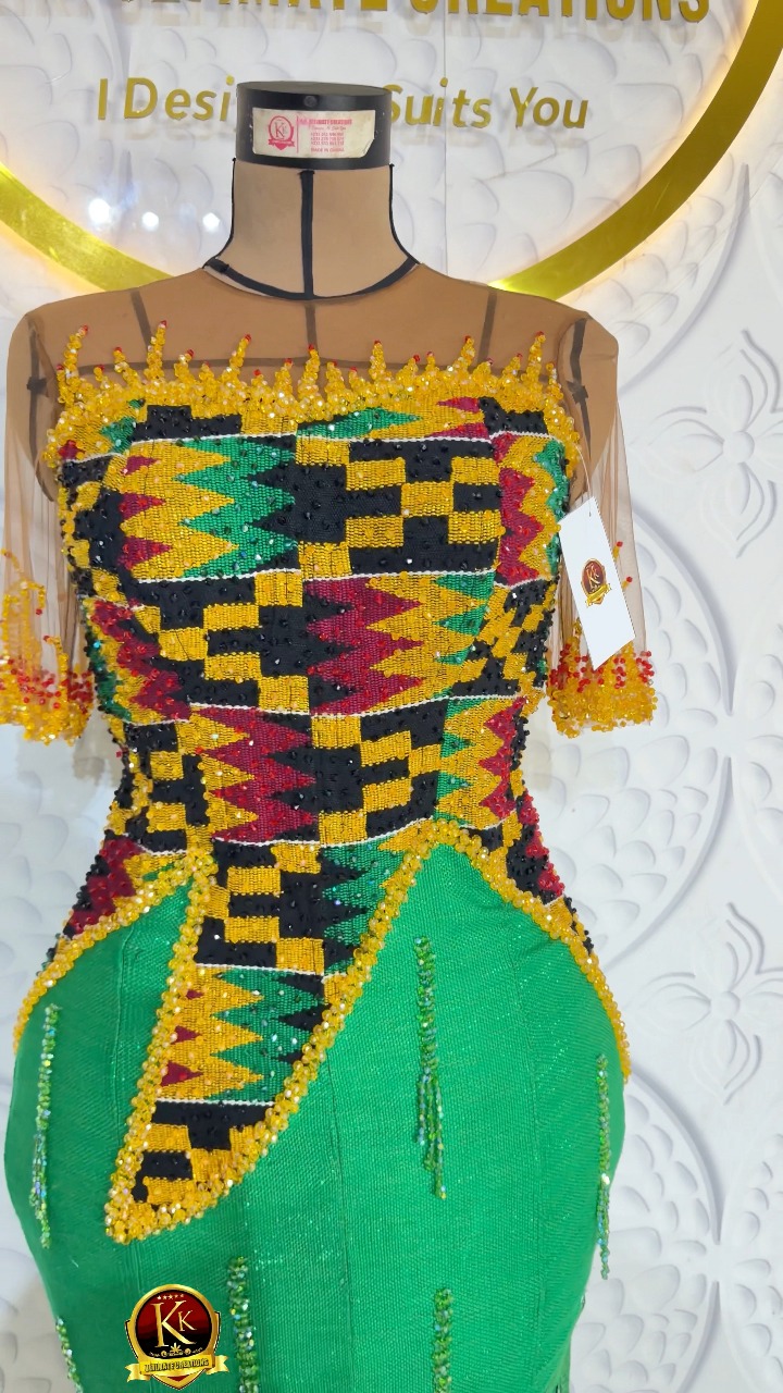 Where rich Kente meets intricate hand-beading, elegance comes to life. This statement piece was carefully crafted to celebrate African beauty, culture, and couture. 💛❤️💚🖤, Dress By: K.K. ULTIMATE 