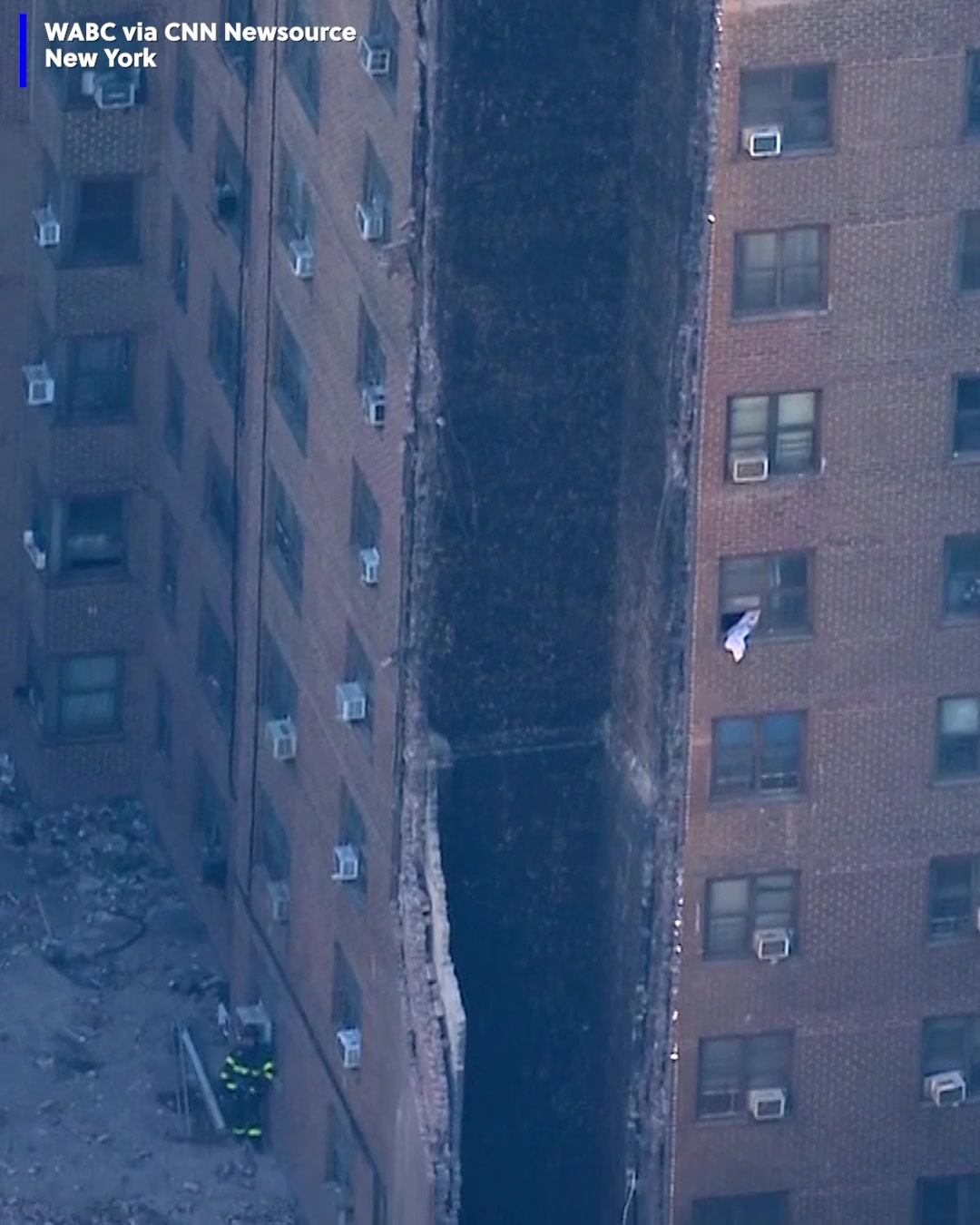 Video shows the aftermath of a partial high-rise apartment building ...
