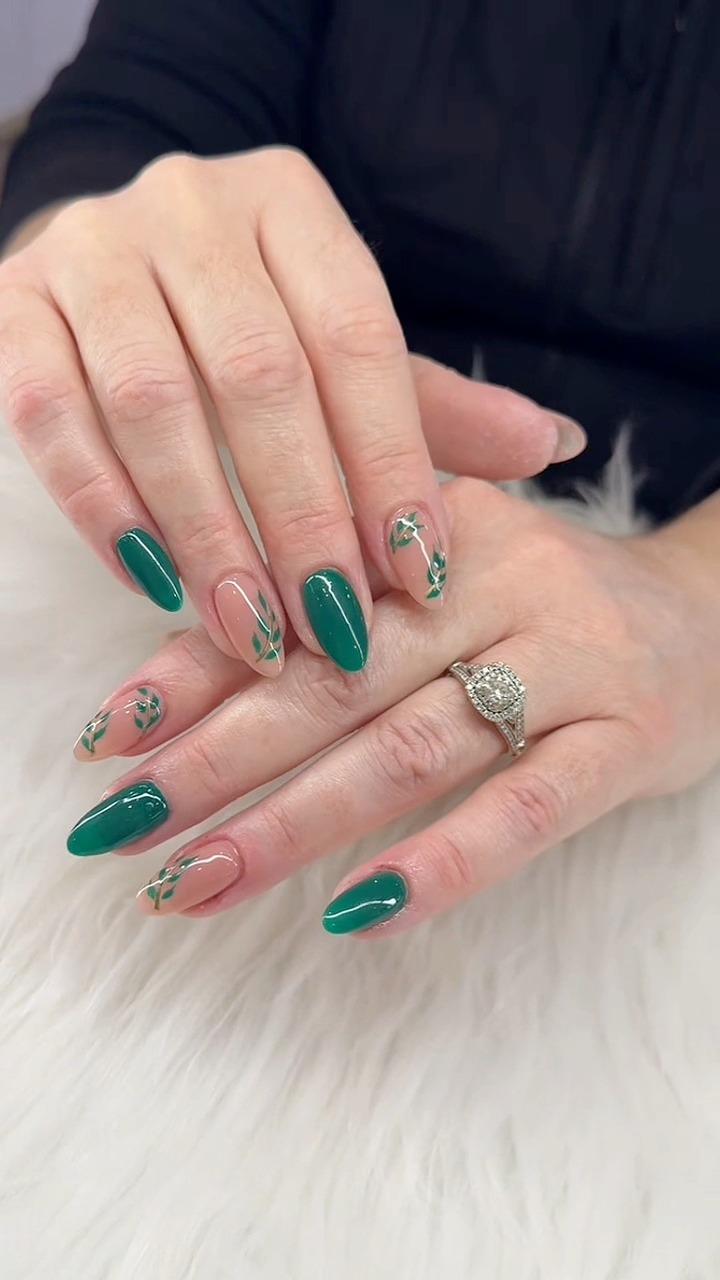 nail art for green dress Simple, elegant, and spring-ready 🌱💅🏻✨, This and nude design with delicate leaf nail is the perfect spring nail look: fresh, minimal, and effortlessly chic. If you love clean, nails to go with green dress