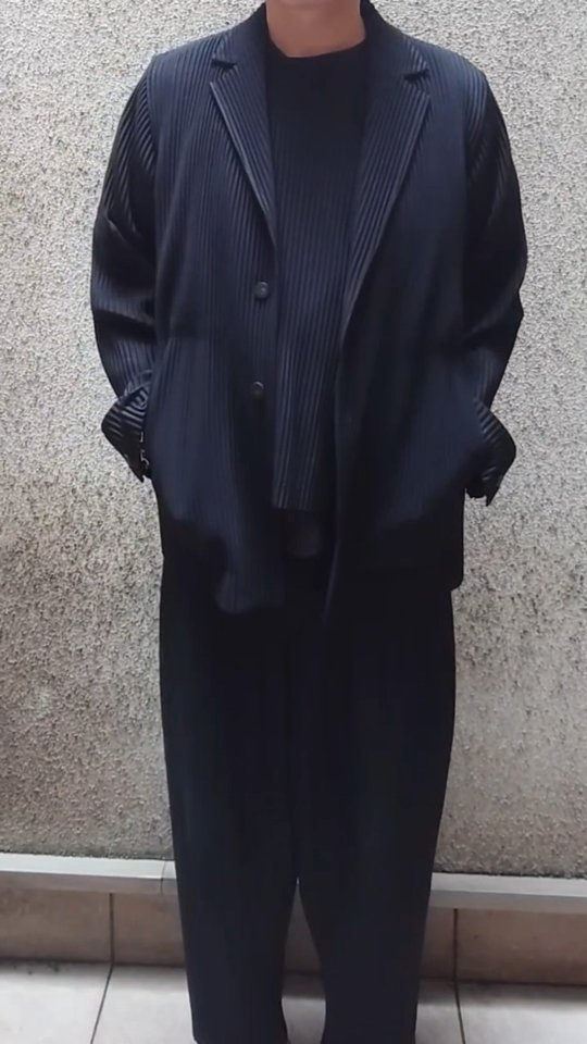 A timeless Homme Plissé Issey Miyake setup. Style it with an inner