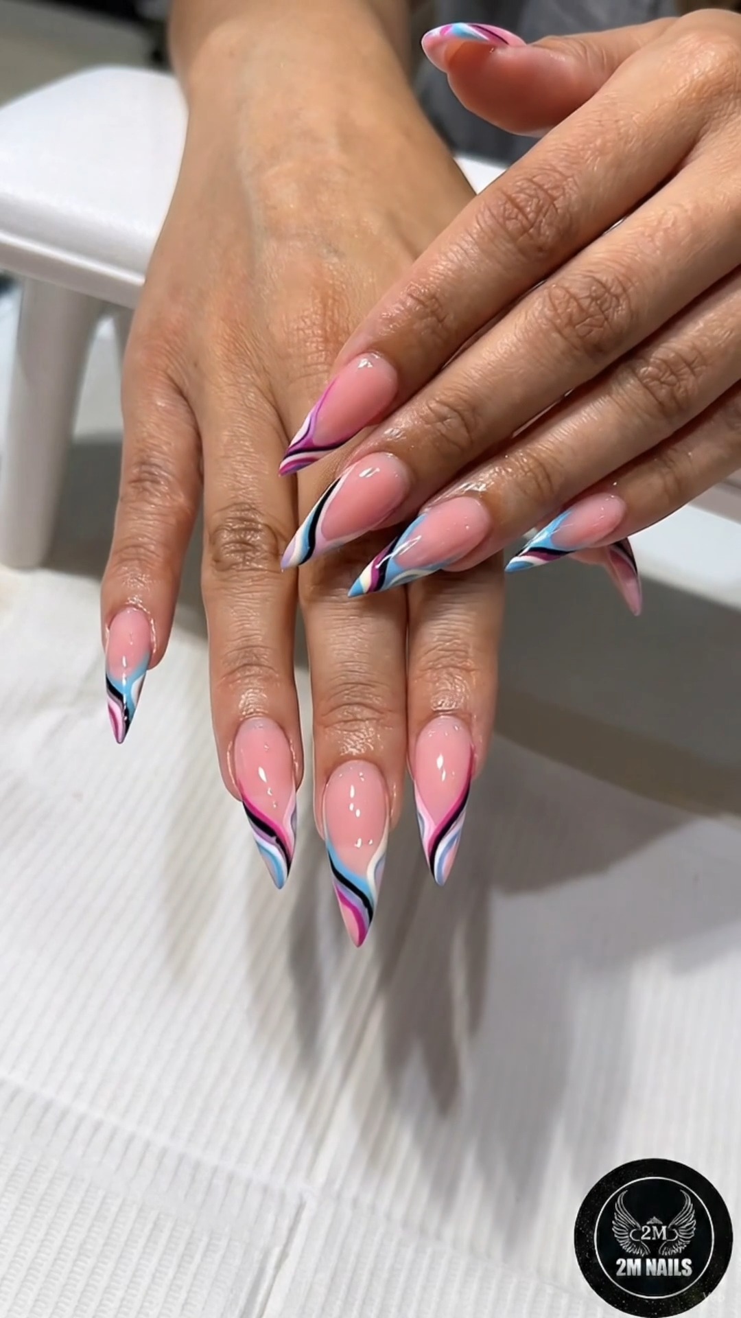 Soft elegance meets bold detail 💅✨ Every stroke, every swirl