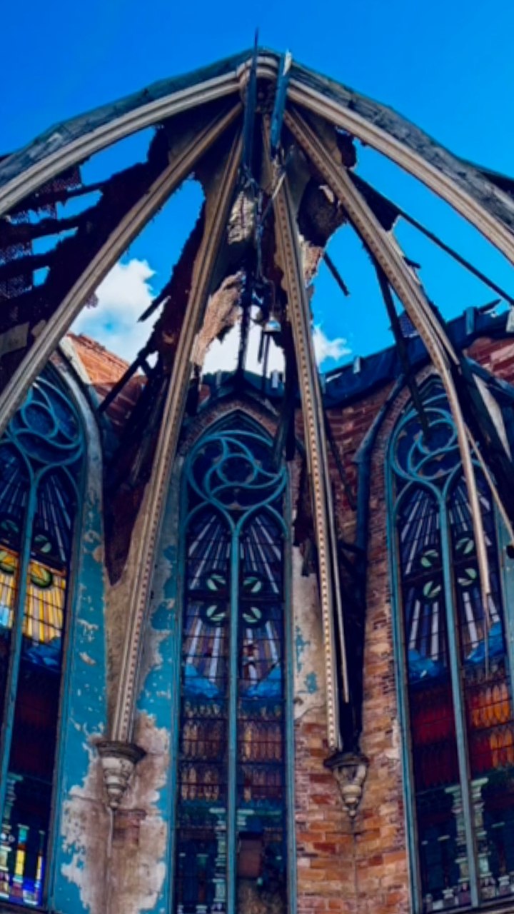 This church has been abandoned, the roof caved in, walls crumbling ...