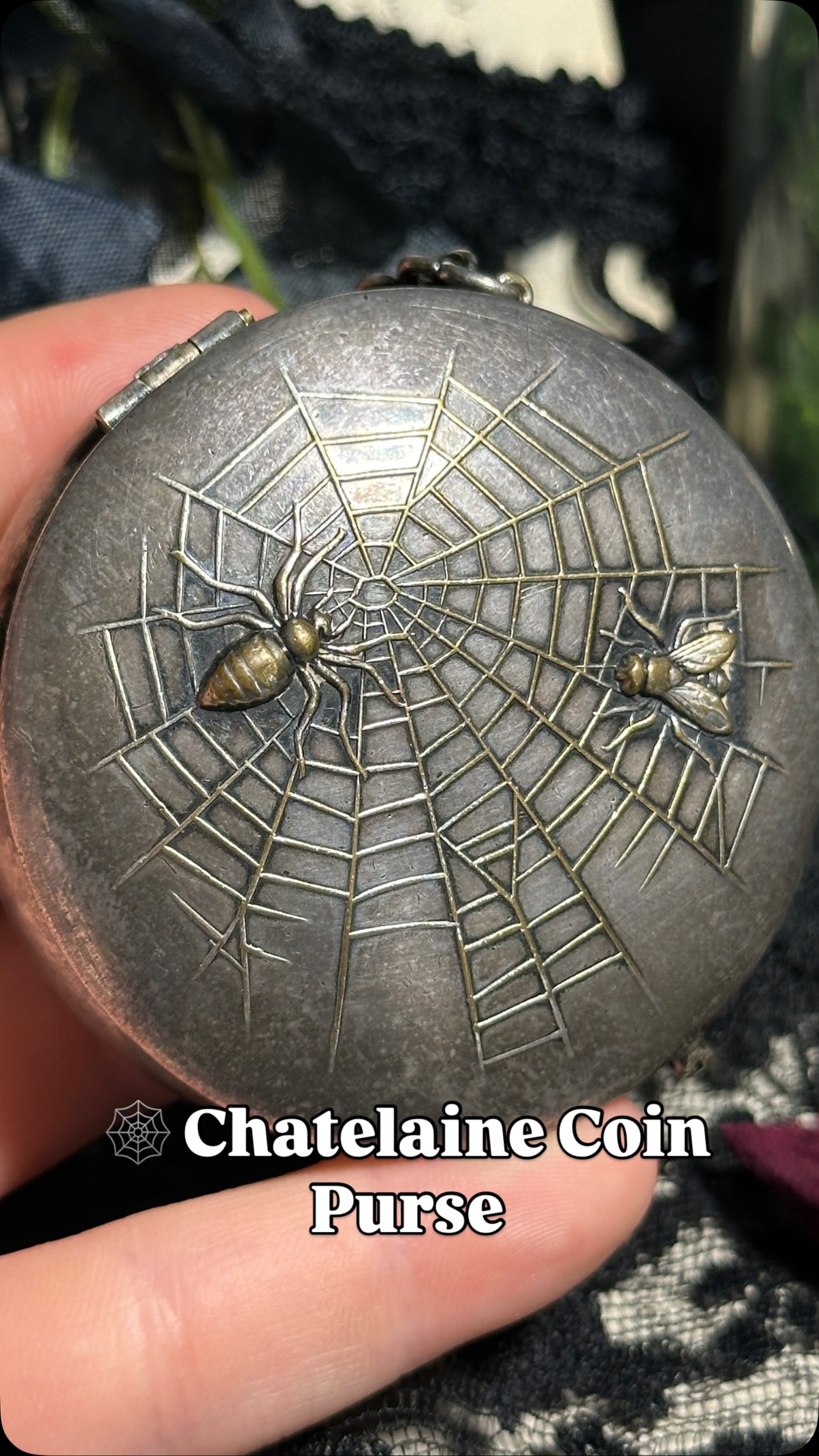 This lovely little silver-plated coin purse would've been able to