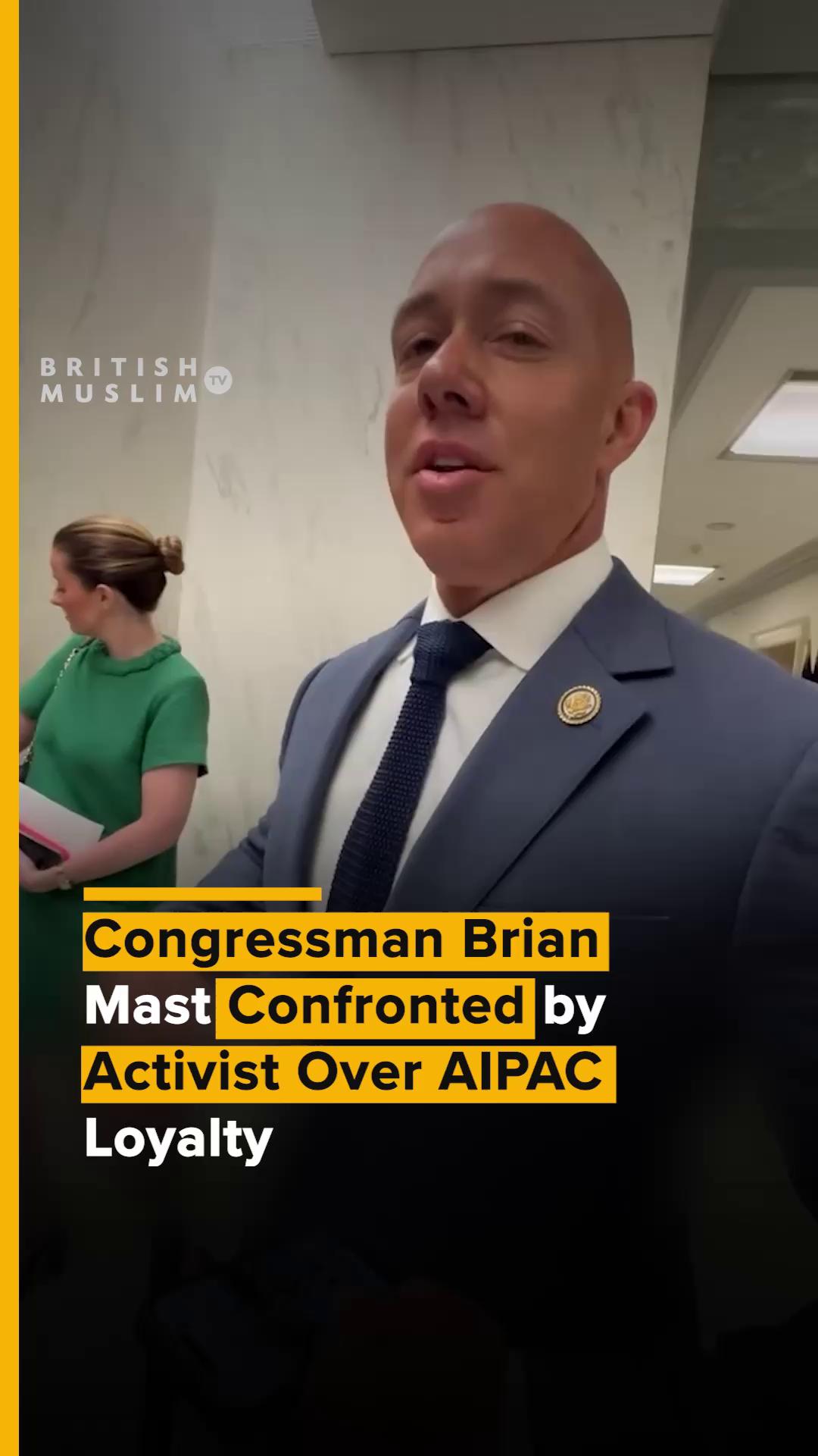 A Pakistani American activist wearing a keffiyeh confronted Congressman ...