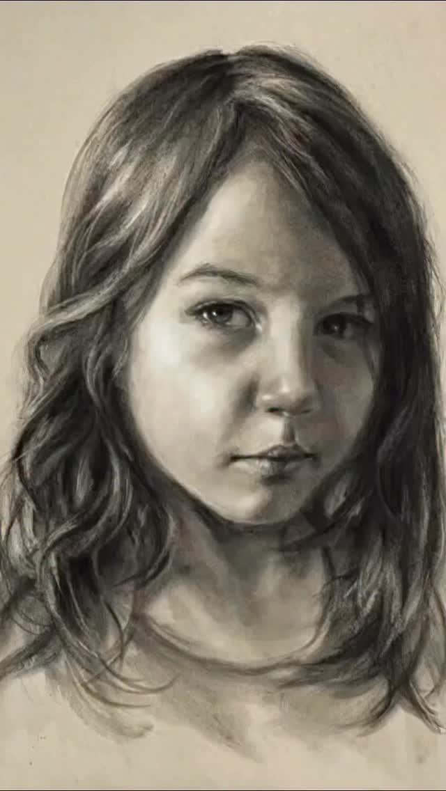 A study in light and character, this portrait captures youthful ...