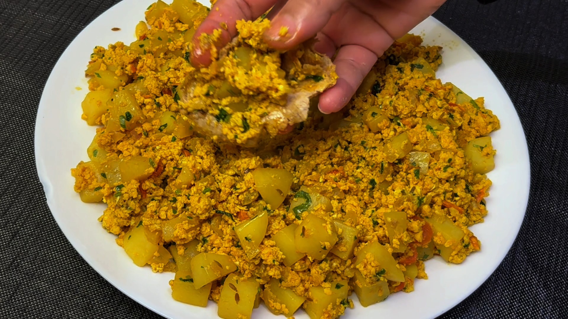 Aloo Anday is a hearty meal with potatoes and eggs, spiced to ...