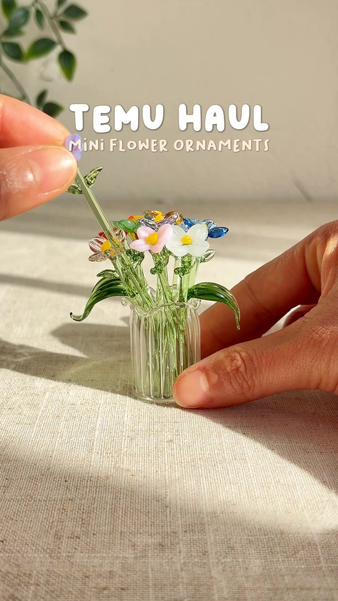 Handcrafted glass flowers in a tiny vase for a sweet desk accent., 🔍 Find it at https://temu.to/m/g3d115ghsiy or with this code xvk 47782. #temu #homedecor | Temu