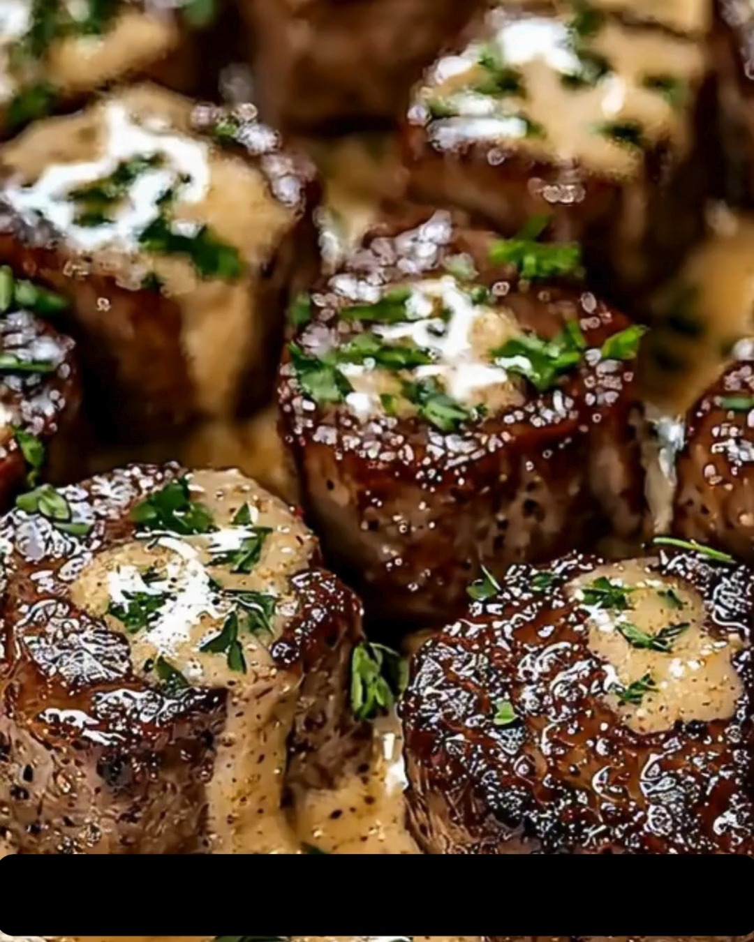 Steak bites smothered in garlic butter and creamy Parmesan are the ...