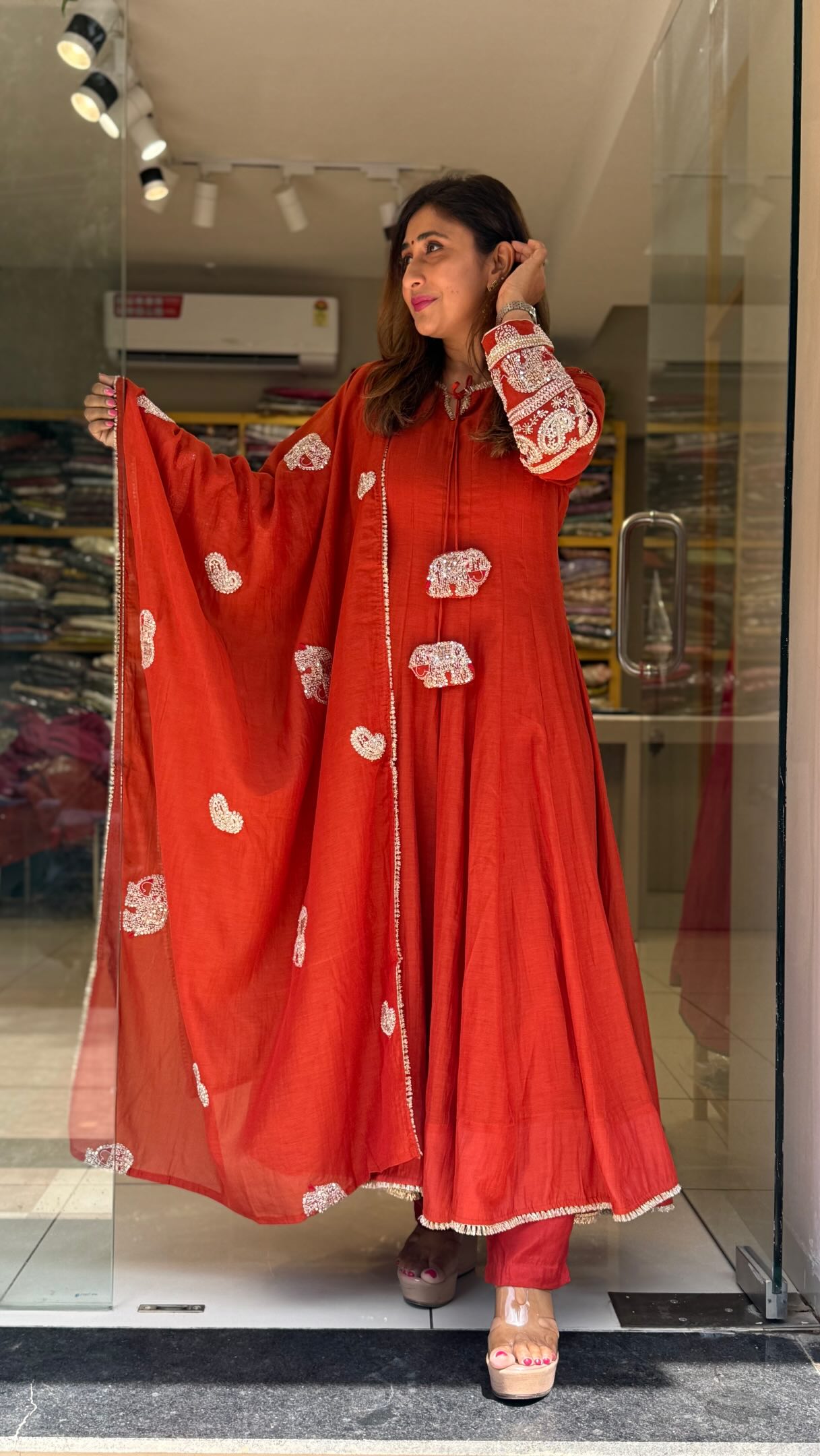 ladies dress shop in vadodara Introducing our Shoulder Kali Anarkali ! , 🌟 Premium Banarasi Mul Chanderi fabric, 🌟 Unique shoulder kali design, 🌟 Elegant Anarkali flare, 🌟 Intricate detailing with a rich, festive appeal, 🌟 Perfect western dress shop near me