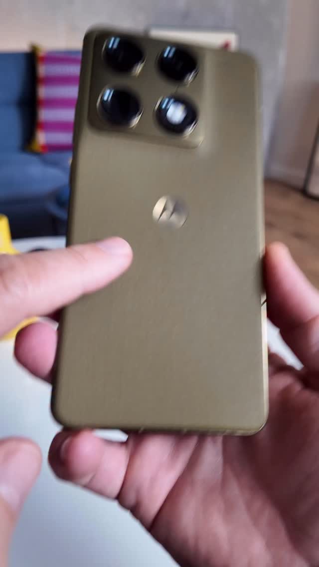 This is Motorola Signature in PANTONE Martini Olive (Gold