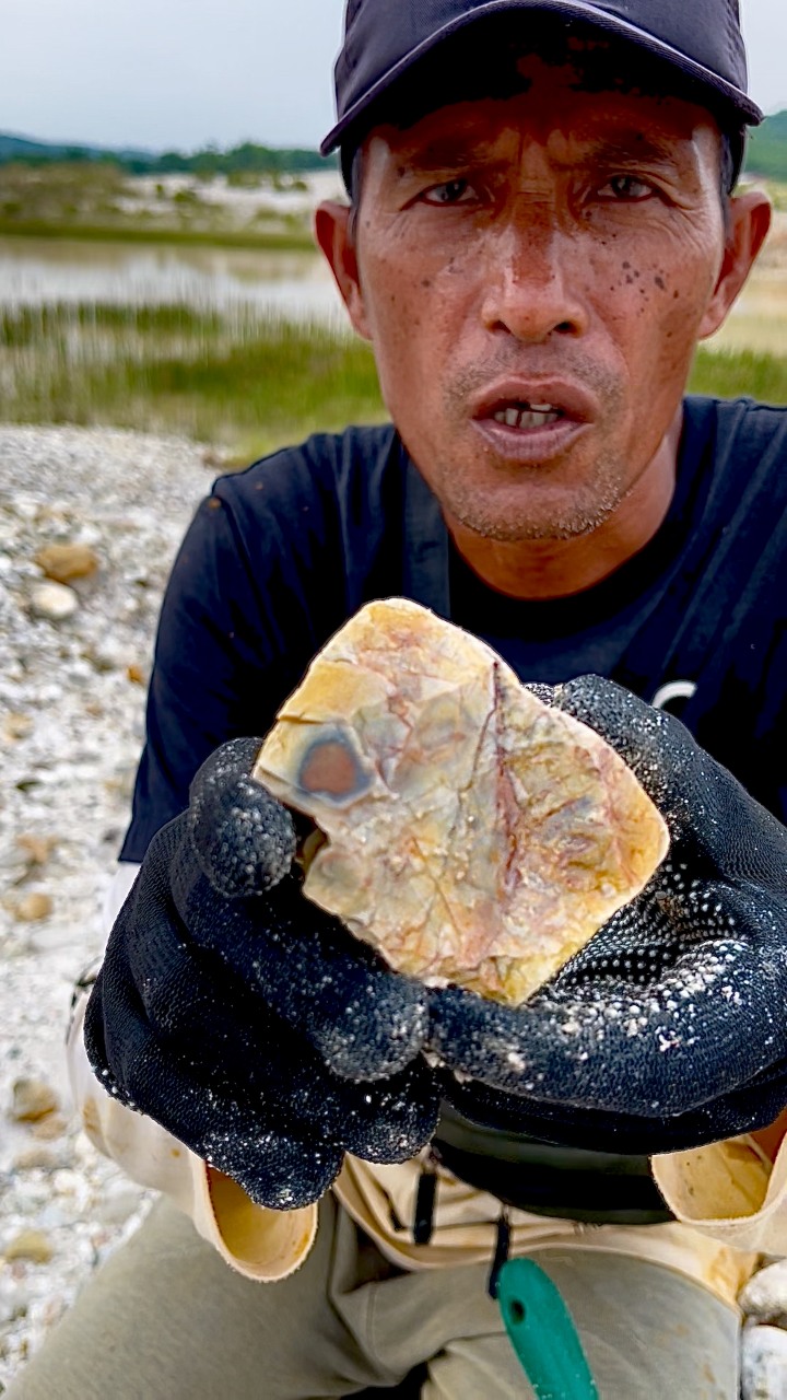 Digging up $999 worth of rocks, on a cliff from a former gold mine. # ...