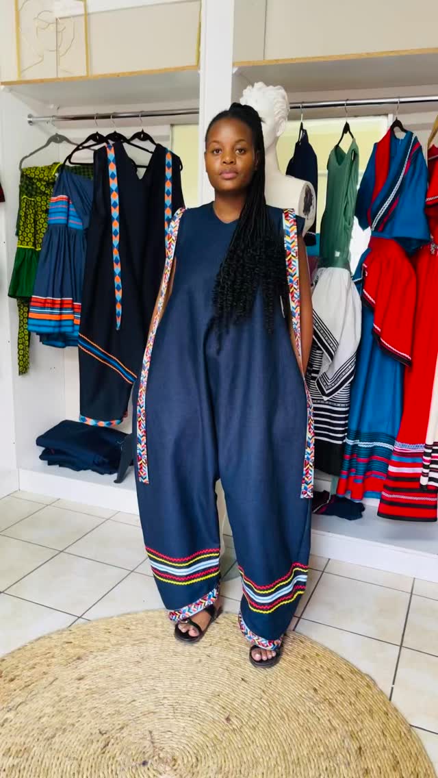 Rocking the denim delela from Nam Creations! This stylish outfit features bold, colorful trim details and comfy black sandals. Perfect blend of traditional vibes and modern cool. #eastlondon 