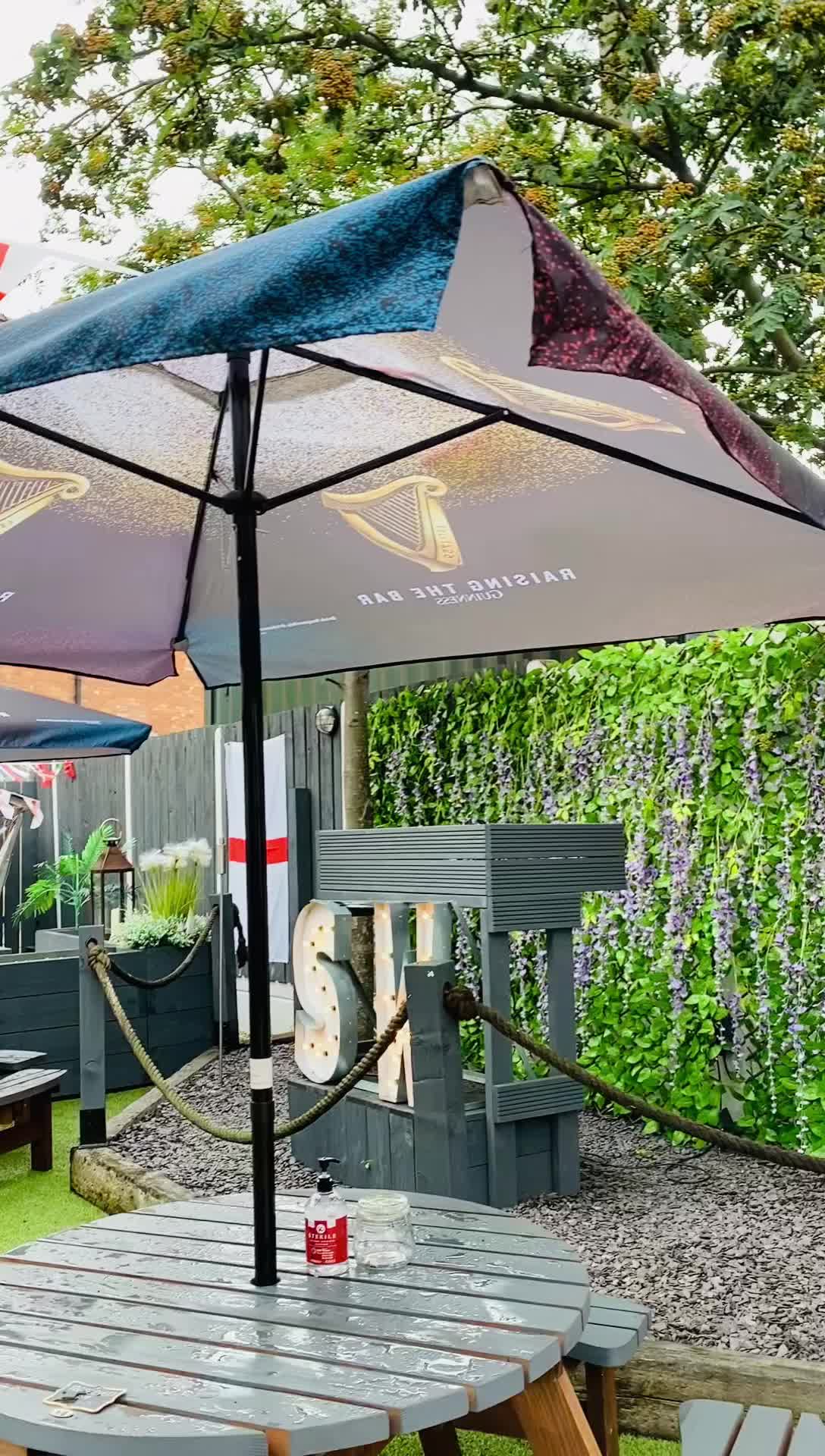 guinness patio umbrella Treasure Garden  11 ft Octagonal Outdoor (High-Performance Auto-Tilt) close button offers quick access when you need it most Guinness Stout w/HARP Logo 7