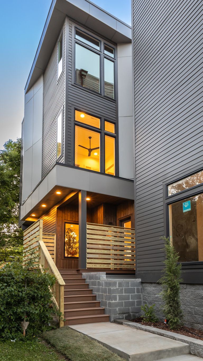 Elevated living in Nashville 🌆, Modern architecture meets warm, inviting  interiors in this striking contemporary home. Clean lines, expansive  windows, and a glowing dusk presence create a seamless ...