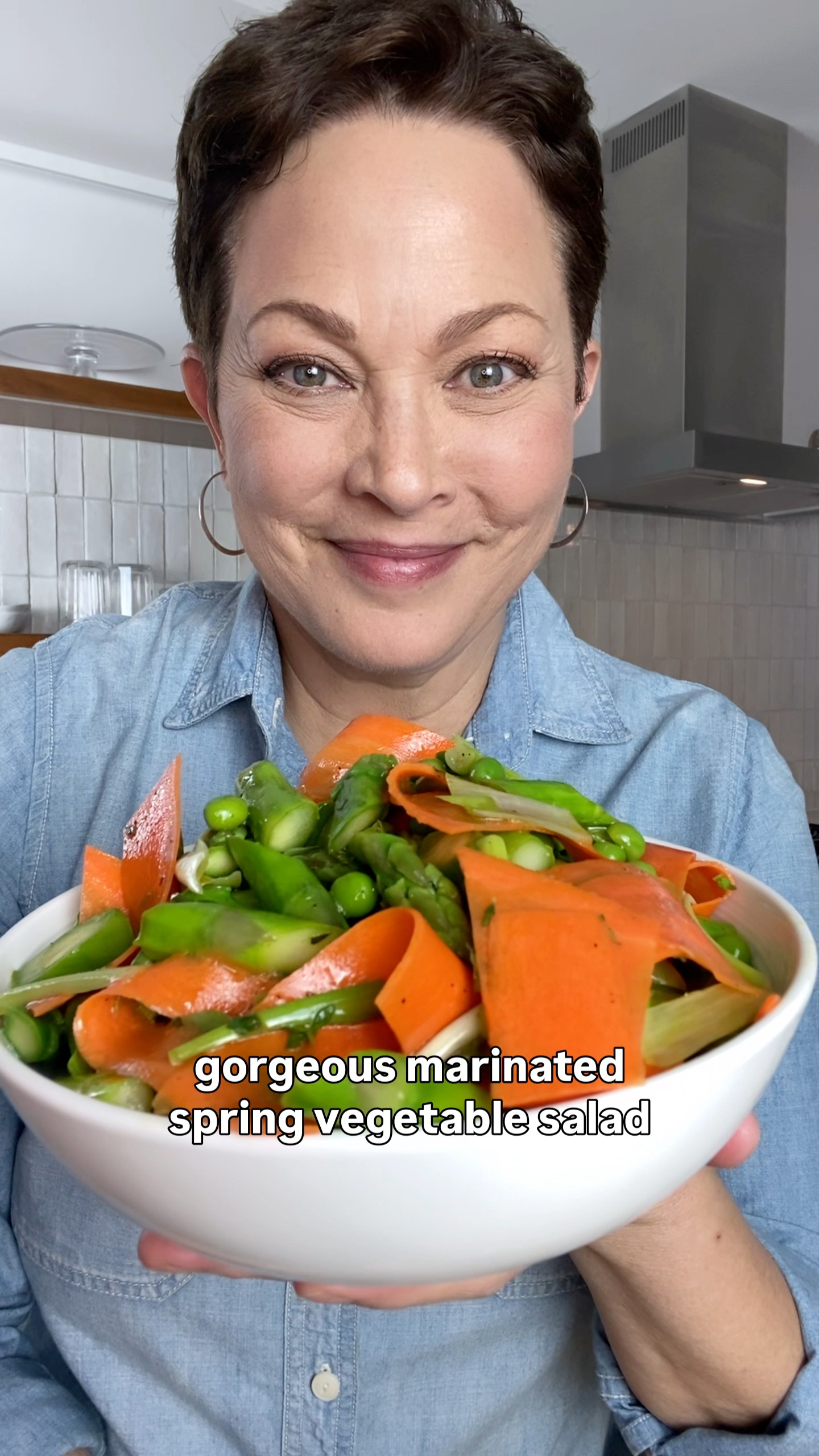 In this vibrant spring vegetable salad, carrots and scallions are thinly sliced into ribbons and marinated in quick pickle-like fashion, so they are infused with a bright, herb-flecked pucker. Tossed 