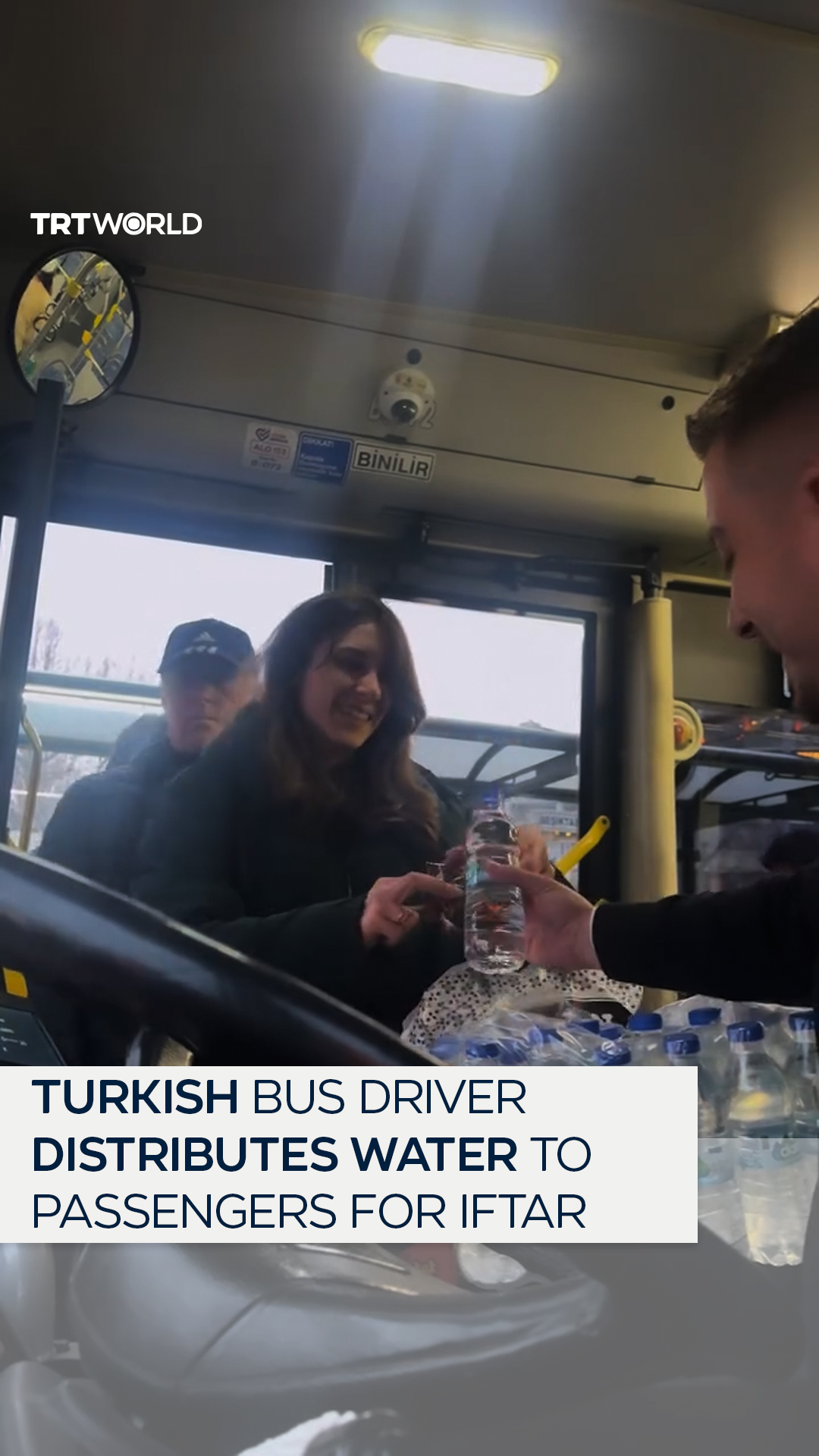 Turkish bus driver Zafer Tellioglu handed out water and muffin to his ...