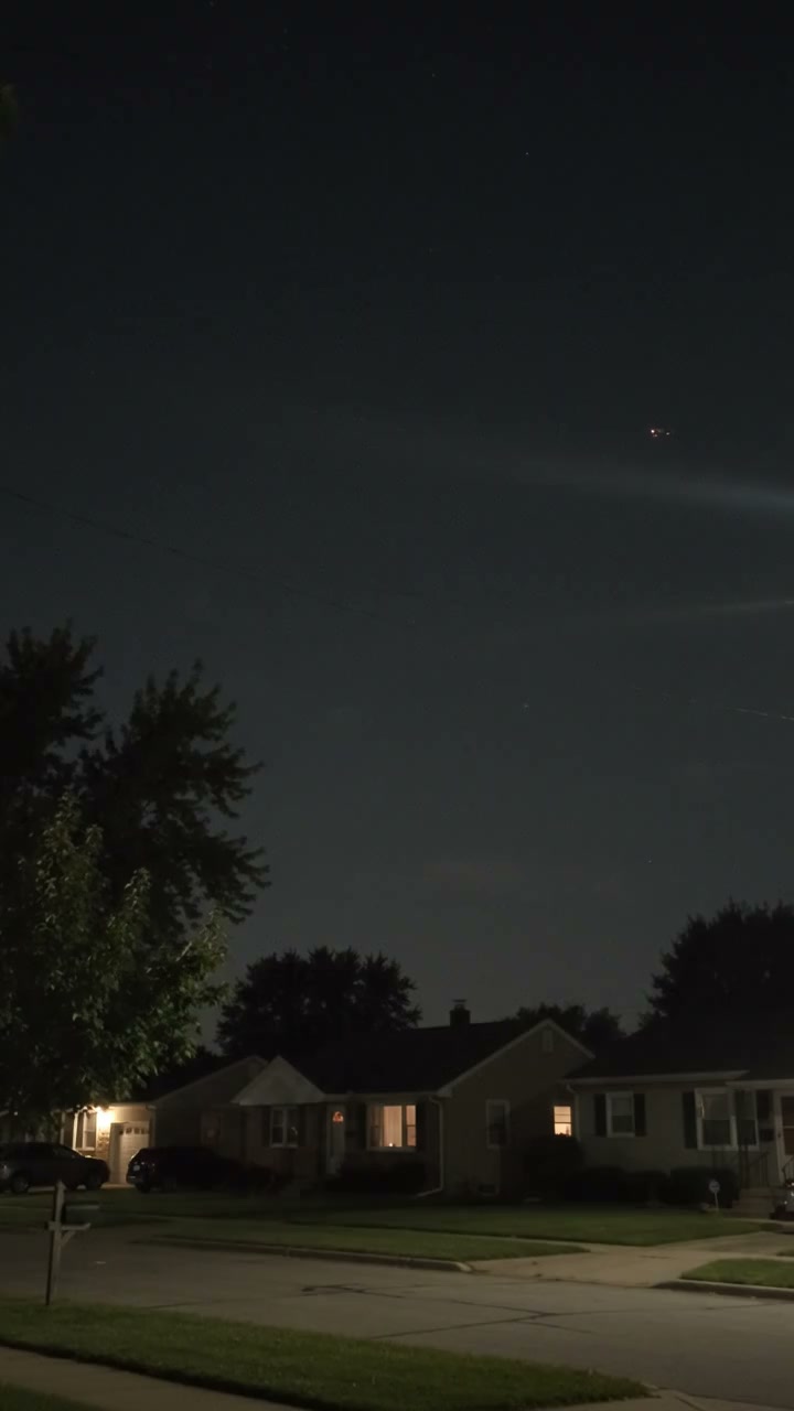 Haunting moment mysterious V-shaped UFO hovers over city | The US