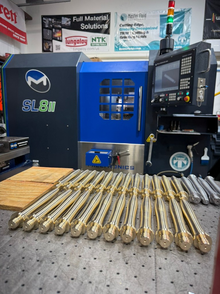 Finishing off a batch of brass handles in the Milltronics USA, Inc. SL8 ...