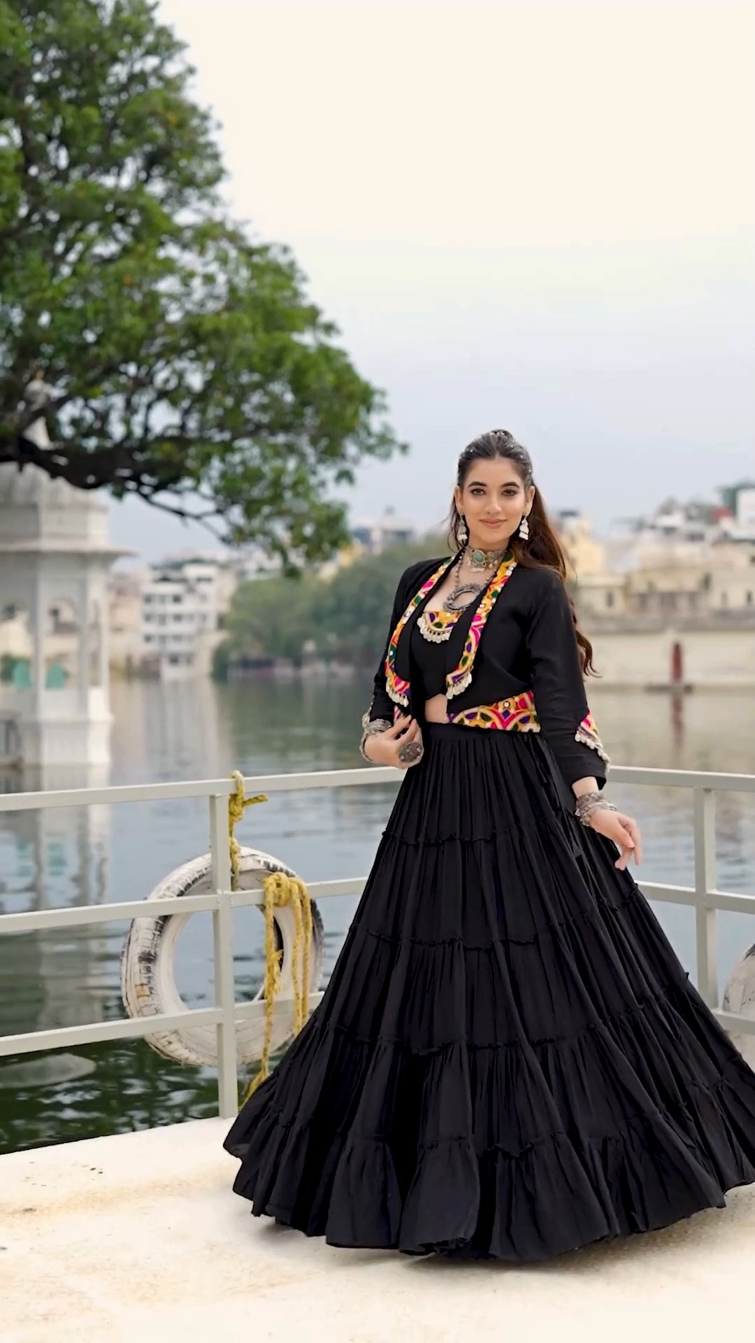 dandiya dress for ladies 🌸Designed to make every Garba and night unforgettable, this beautiful black tiered lehenga is paired with a handcrafted Kutchi Pattern Koti (Jacket) adorned with colorful embroidery, mirror Weight:2.200-LBS