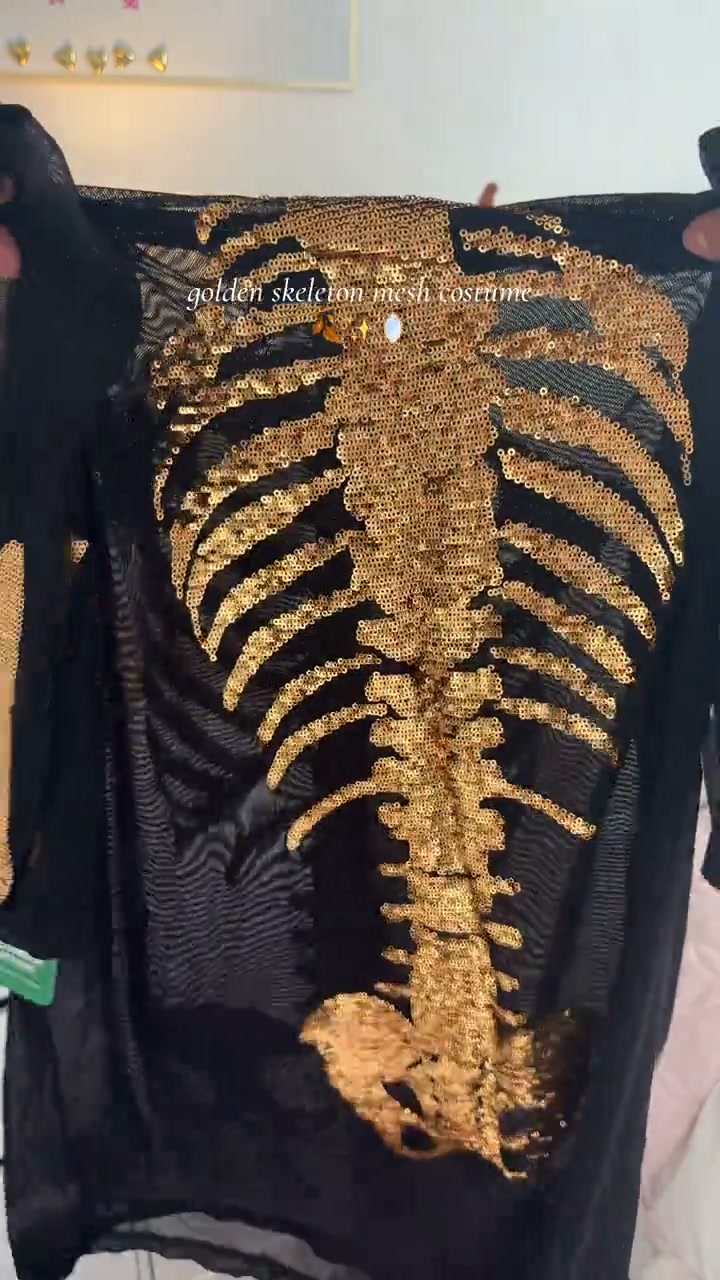 gold skeleton mesh costume dress A costume, but make it gold. The Tipsy Elves Skeleton puts a glam spin on a Halloween classic with a head-turning metallic skeleton design. Even better? First-time customers SCV021327_R_M