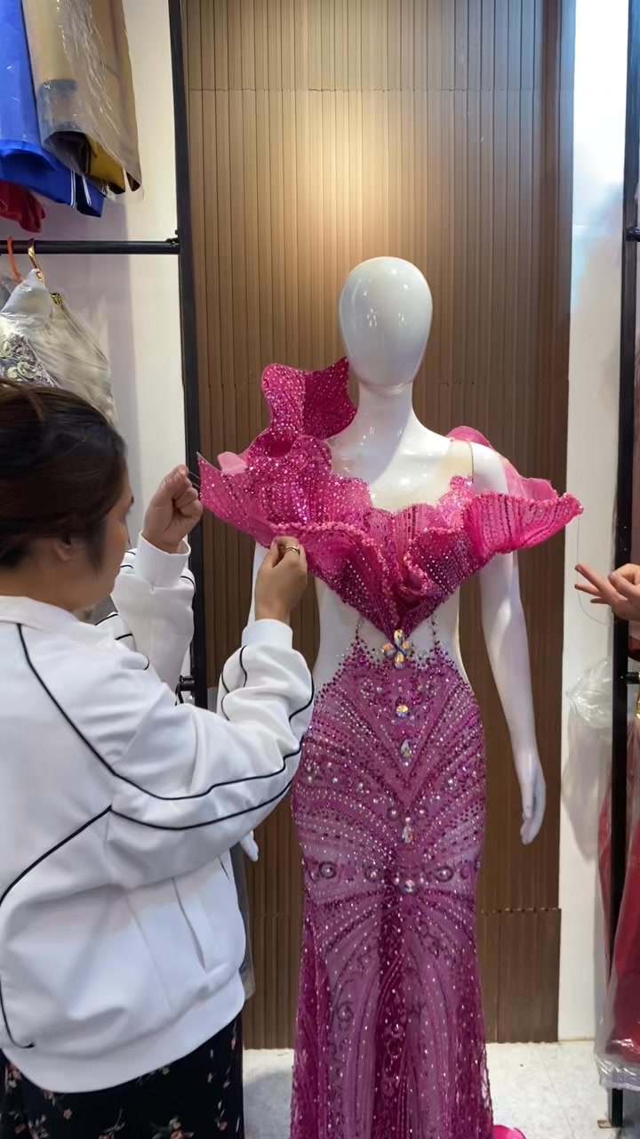 This gown blooms with the elegance of the Waling-Waling, the Queen of ...