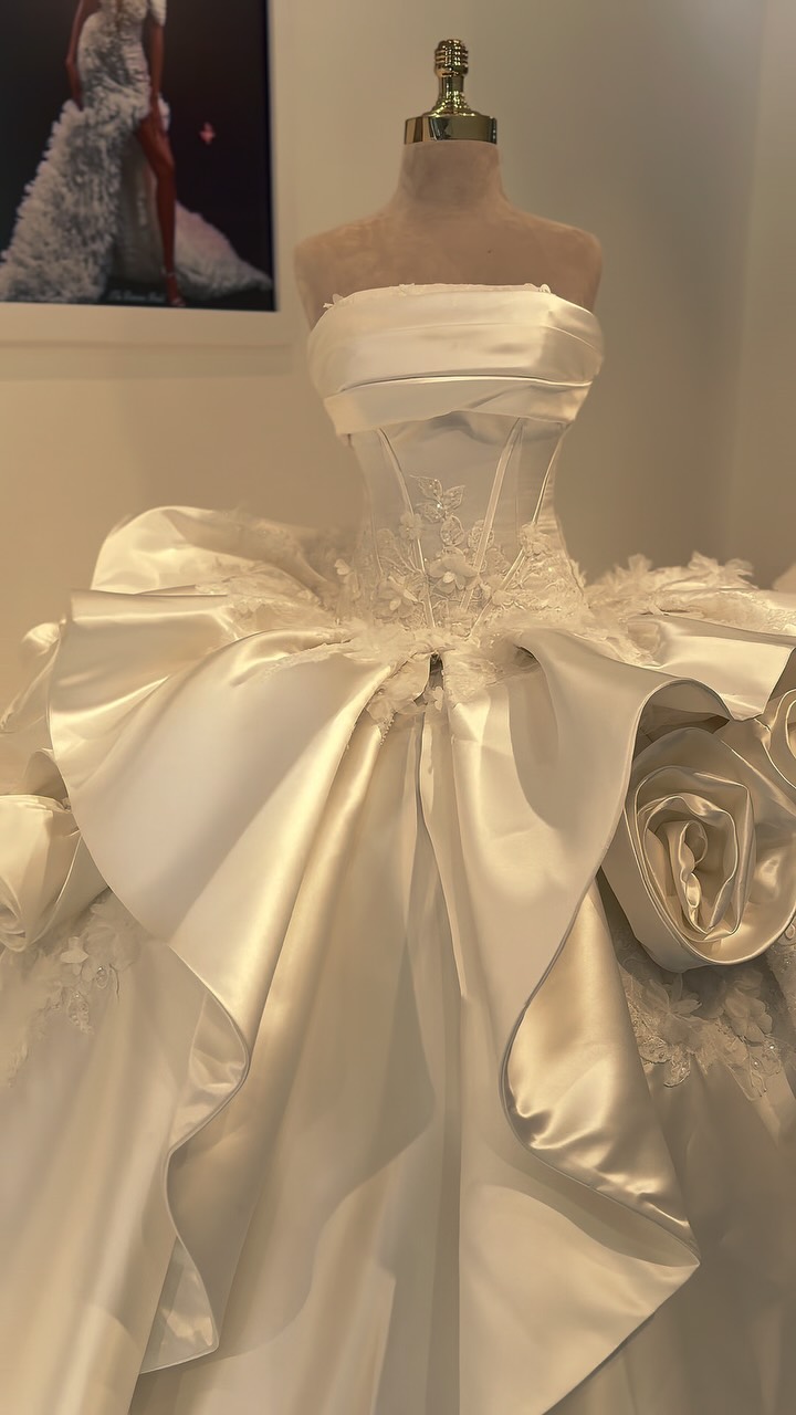 Introducing The Victorian Gem 2027 04 — a couture wedding gown designed around structure, volume and statement craftsmanship., Featuring a sculpted corset bodice, strapless folded neckline, intricate 