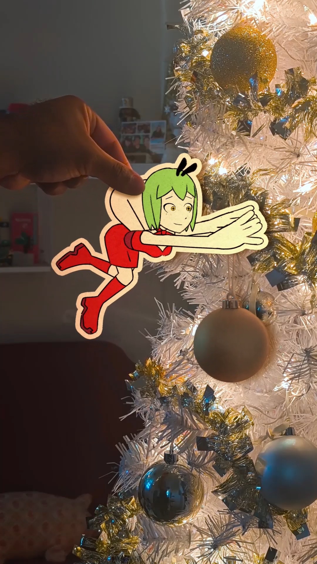Flyra tried her best to help decorate our Christmas tree. I hope she ...