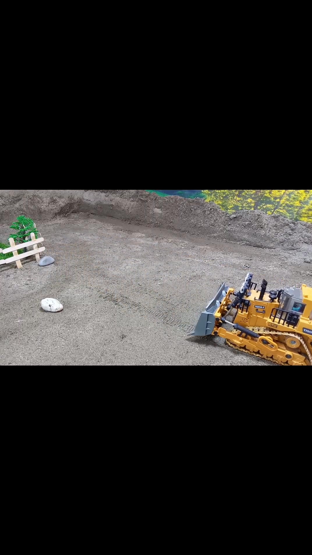 Rc bulldozer pushing rocks at quarry site. #rcexcavator #rcdumptruk # ...