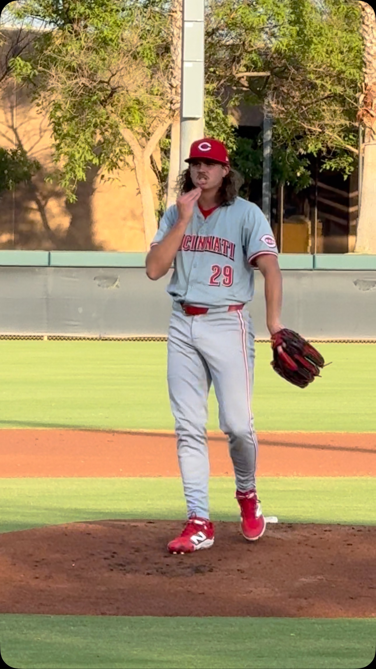 Cincinnati Reds Rhett Lowder warming up before pitching in his first ...