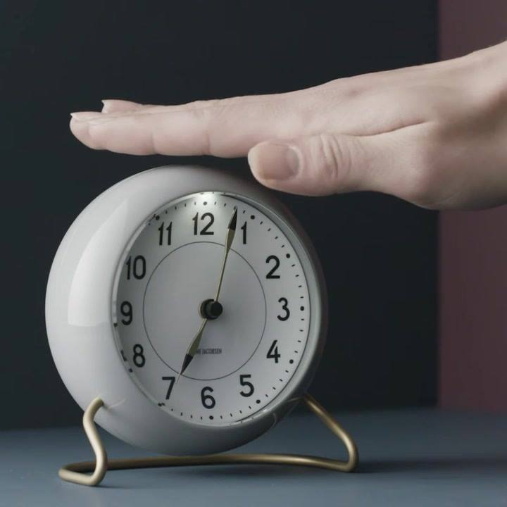 The table clock or alarm clock, was designed by Arne Jacobsen back
