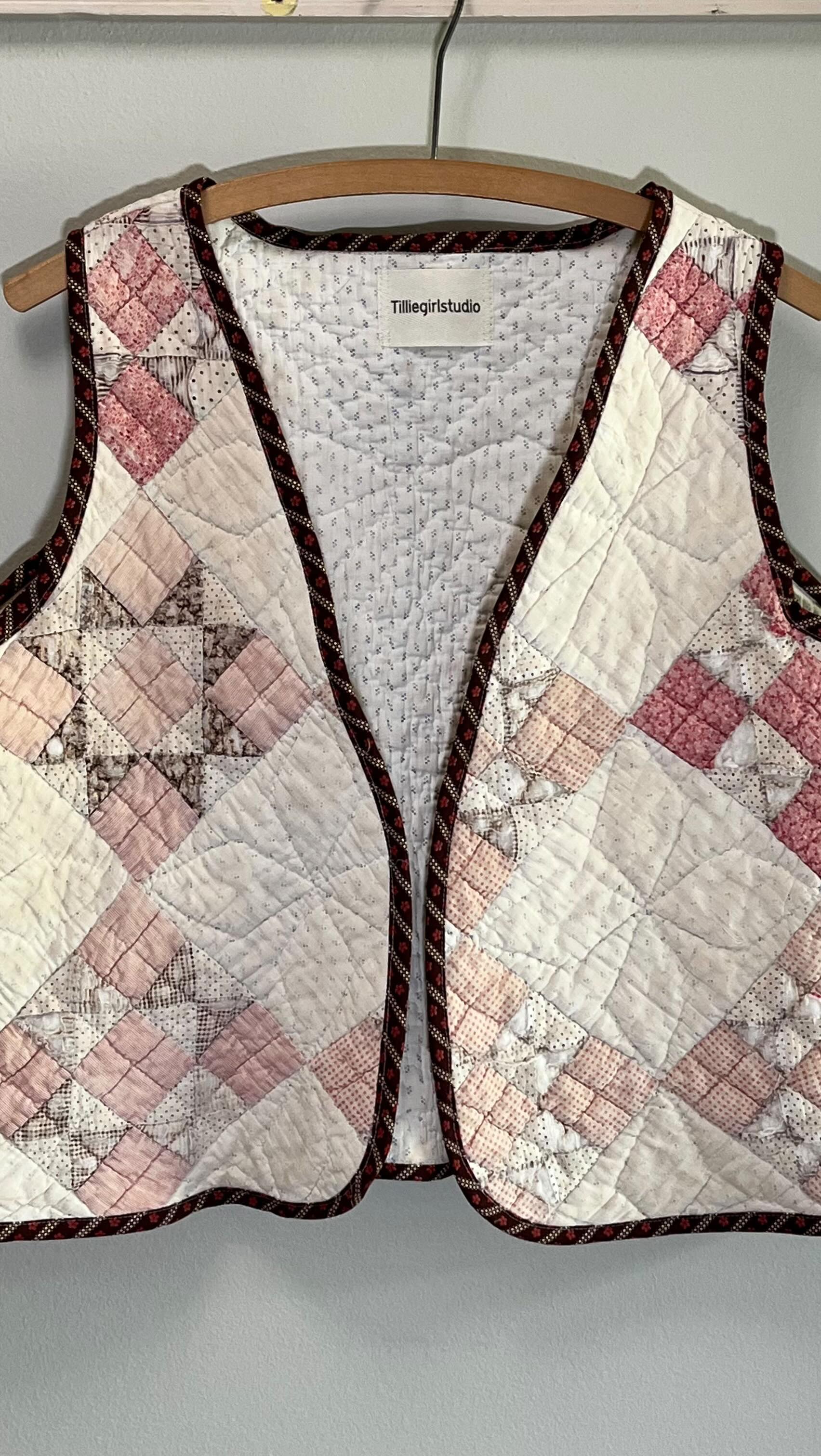 Vest made from repurposed quilt with sashiko and applique
