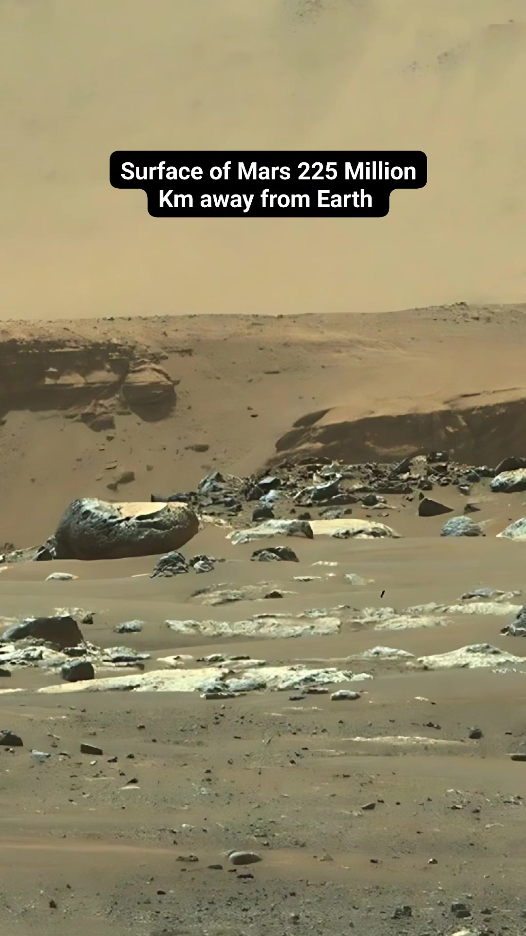 From millions of kilometres across space, Mars shows a rugged red ...