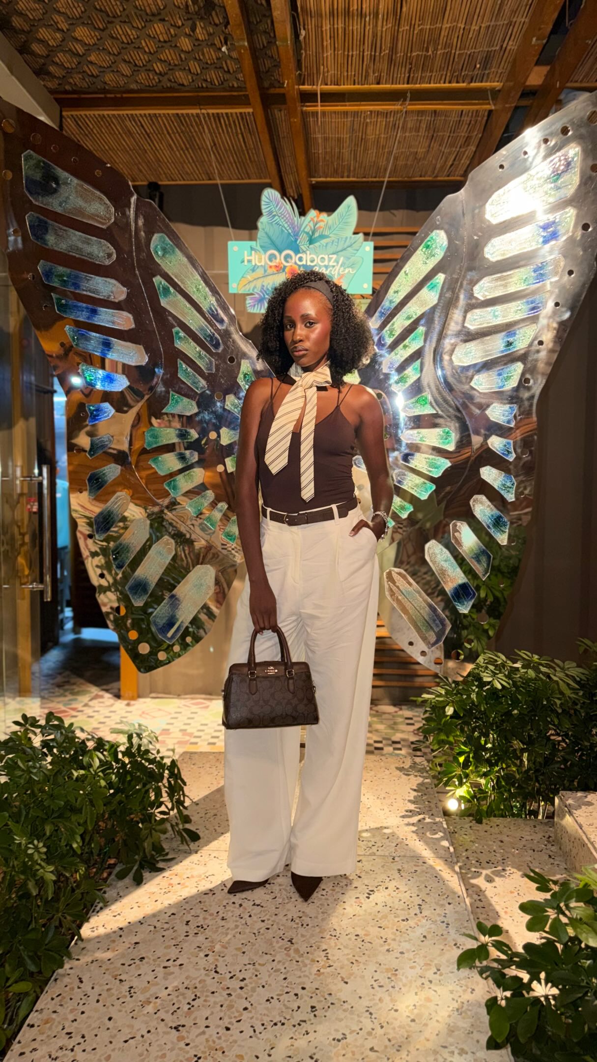 Birthday party dress code: a little classy, a little Smooth Criminal 🕺🏿🤎🤍 My dad’s tie understood the assignment 👔🌸, Outfit details:, Trousers: @zara, Top: @hm, Heels: @stradivarius, Bag: @coach, 
