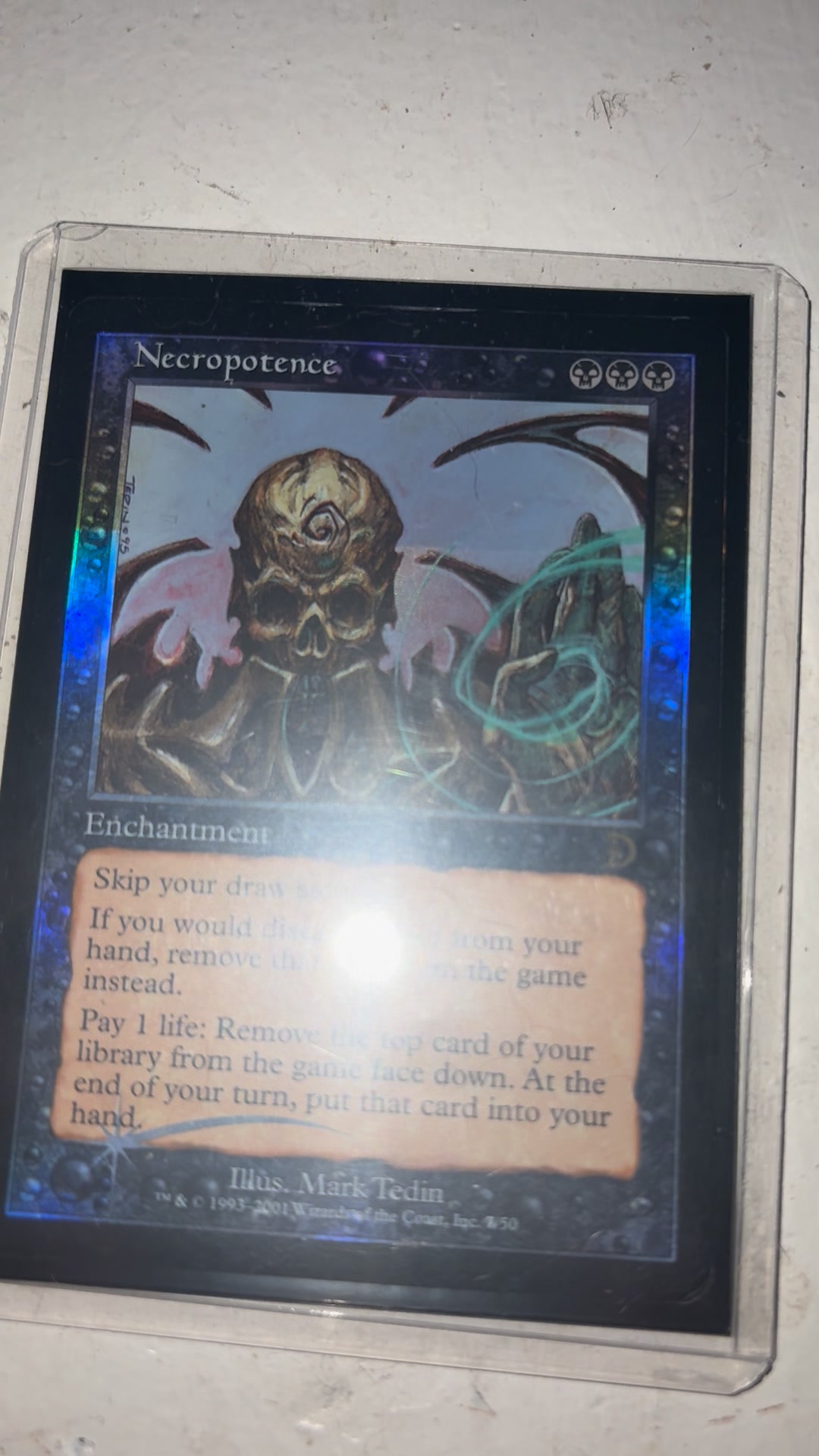 This promo foil crux of fate is missing the expansion simbol in