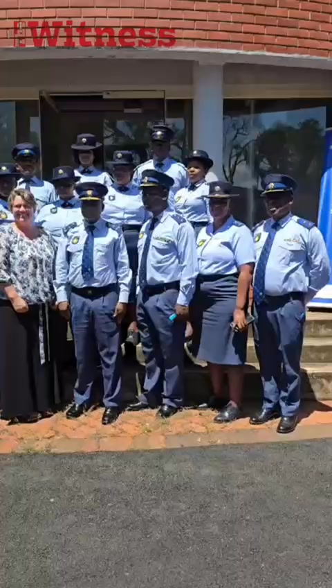 Newly promoted police members receive their ranks during a conferral ...