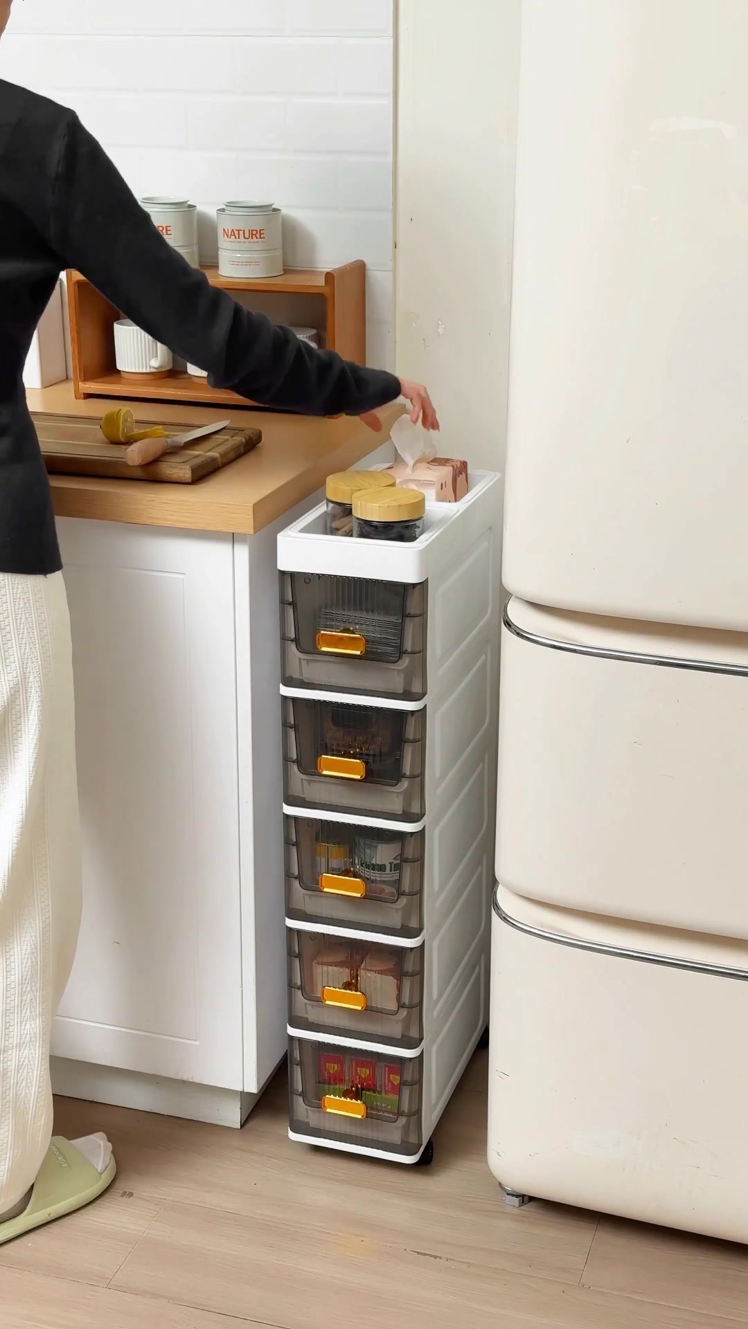 A tall, space-saving drawer tower that keeps toiletries and essentials ...