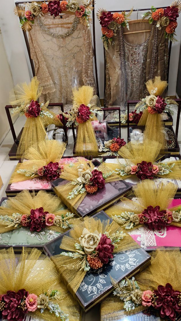 Golden and maroon hues making this engagement trousseau packing truly stunning ✨, Elegance in every tray packed , @the_wrapping_store, Call/ whatsapp us on +91 7976213152, Tags , Bridal Trousseau 