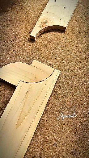 Carpenter's creation forms a wooden list turn using the help of rope # ...