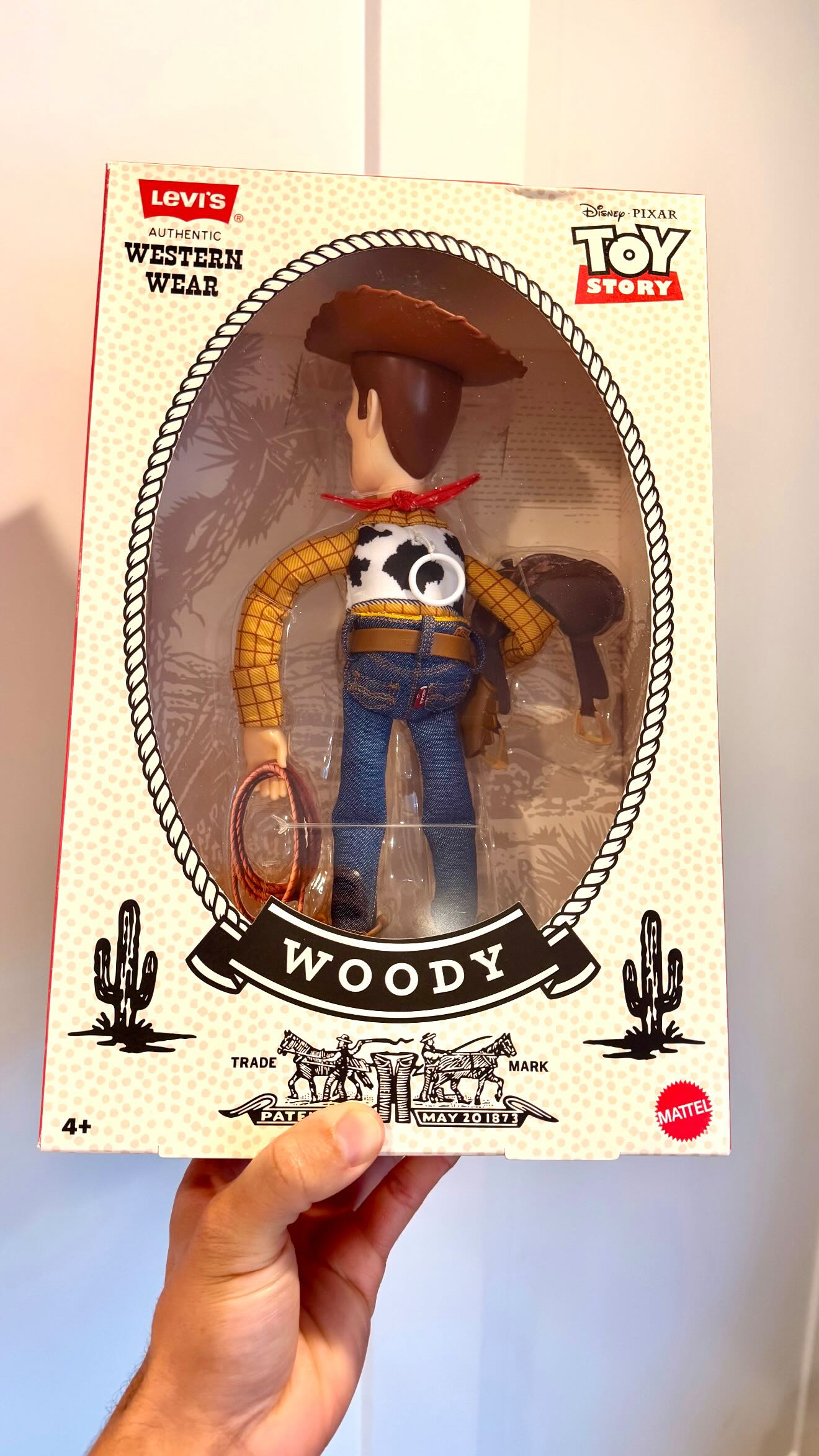 Toy Story 30th Anniversary Mattel Levi's Woody doll figure. These