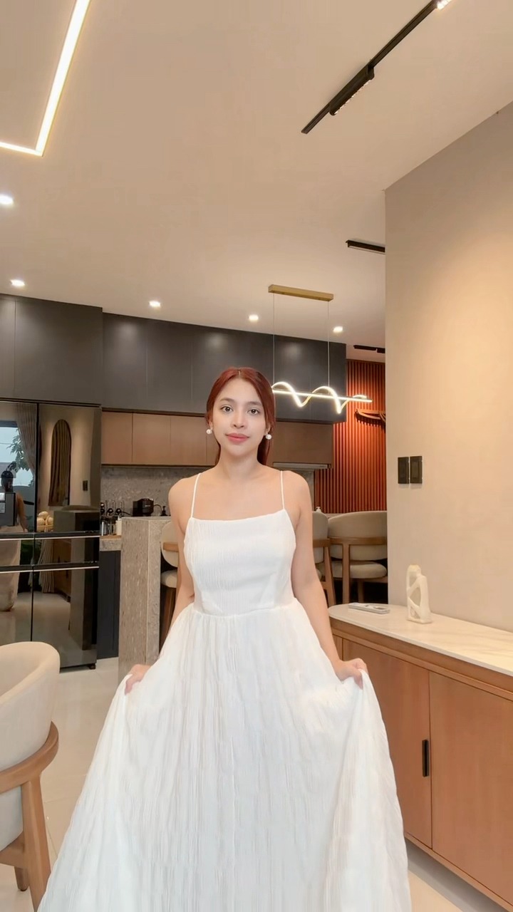 White Beach Dress Try-On at Modern Kitchen Interior