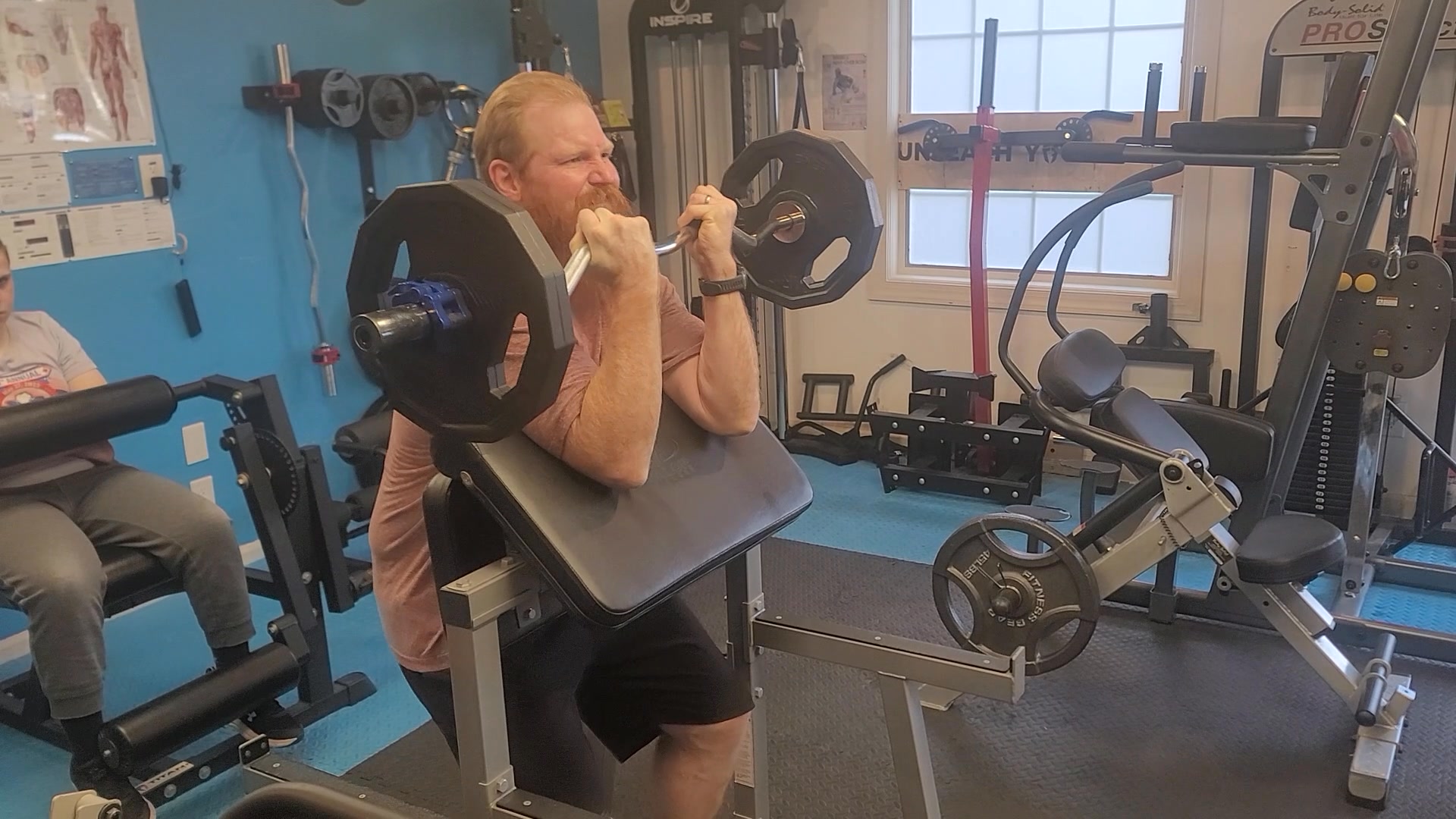 Ryan building biceps. Let that preacher bench keep Your elbows ...