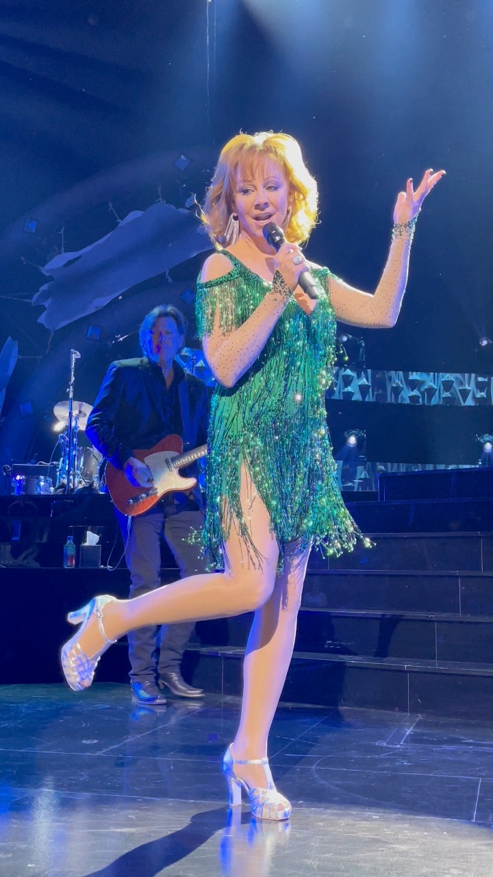 reba mcentire green dress Perfection Thy Name is Reba! Everyone who doesn’t like the should watch a little movie starring called Christmas In Tune! Then the green dress will make sense! It’s fun! 2021 Music awards