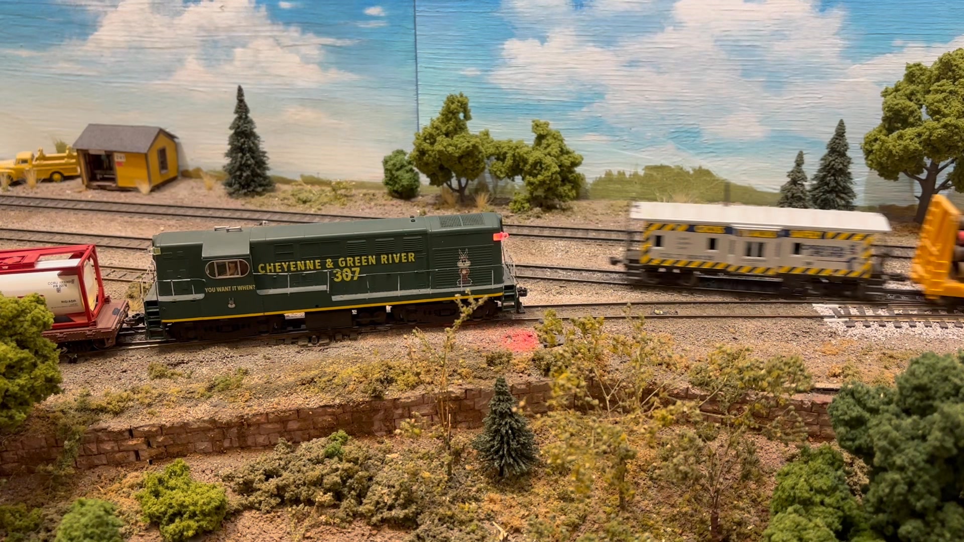 A local switcher waits for clearance from dispatch as a mainline ...