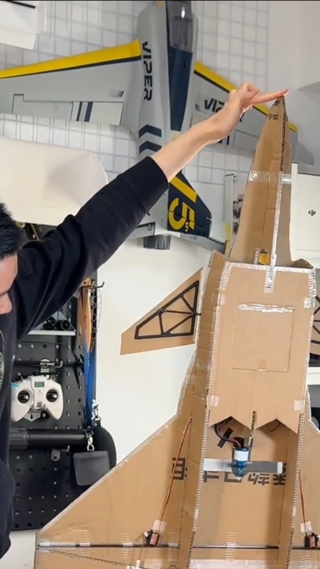 A model aircraft enthusiast achieves a seemingly impossible task ...