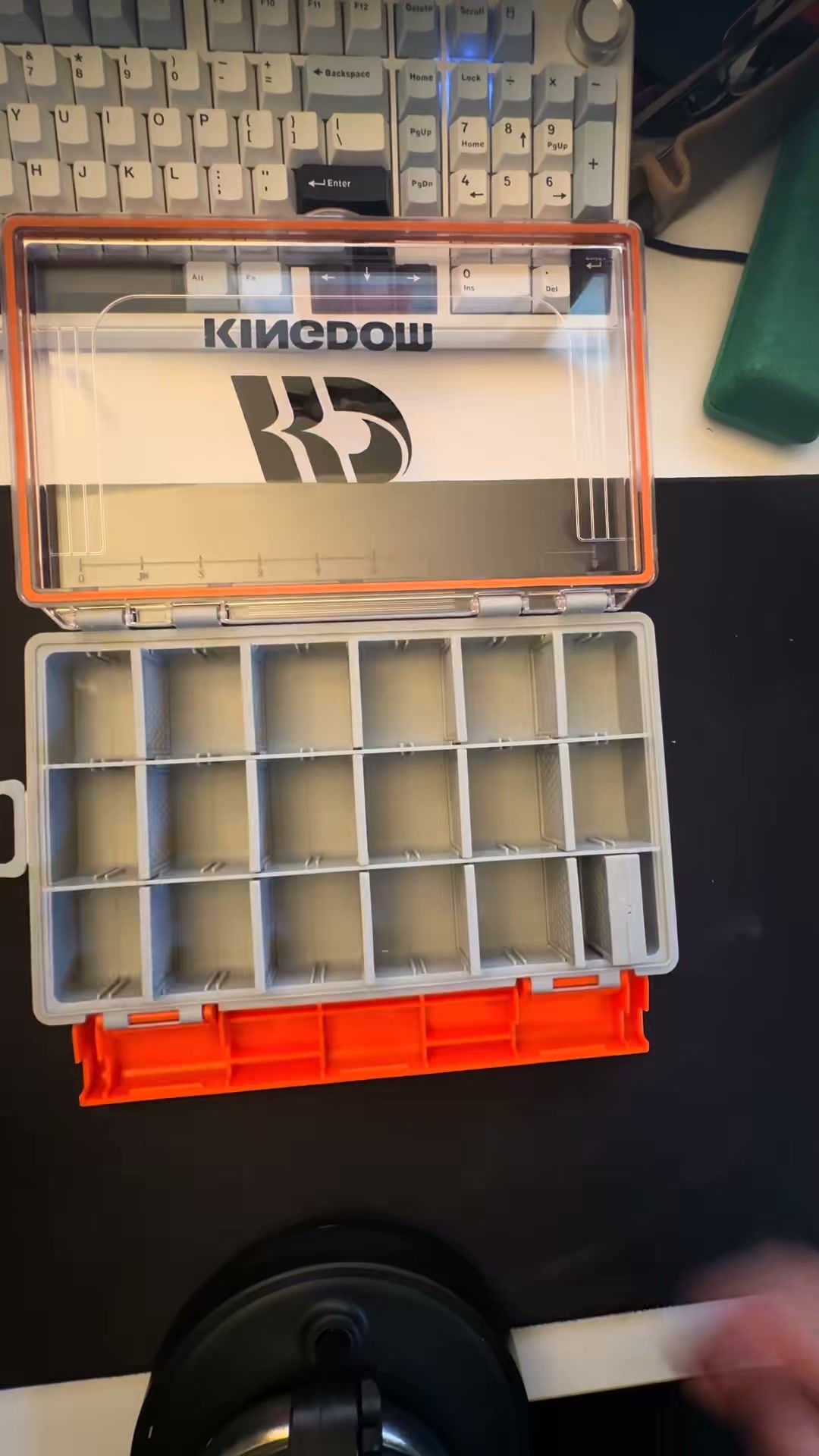 filling a tackle box Gonex Waterproof Boxes action latches to keep everything securely in place Refilling tacklebox with snacks nearby