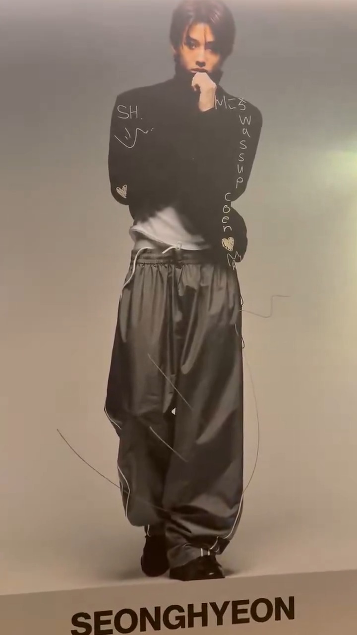 cortis' signed posters at their pop up store in Japan