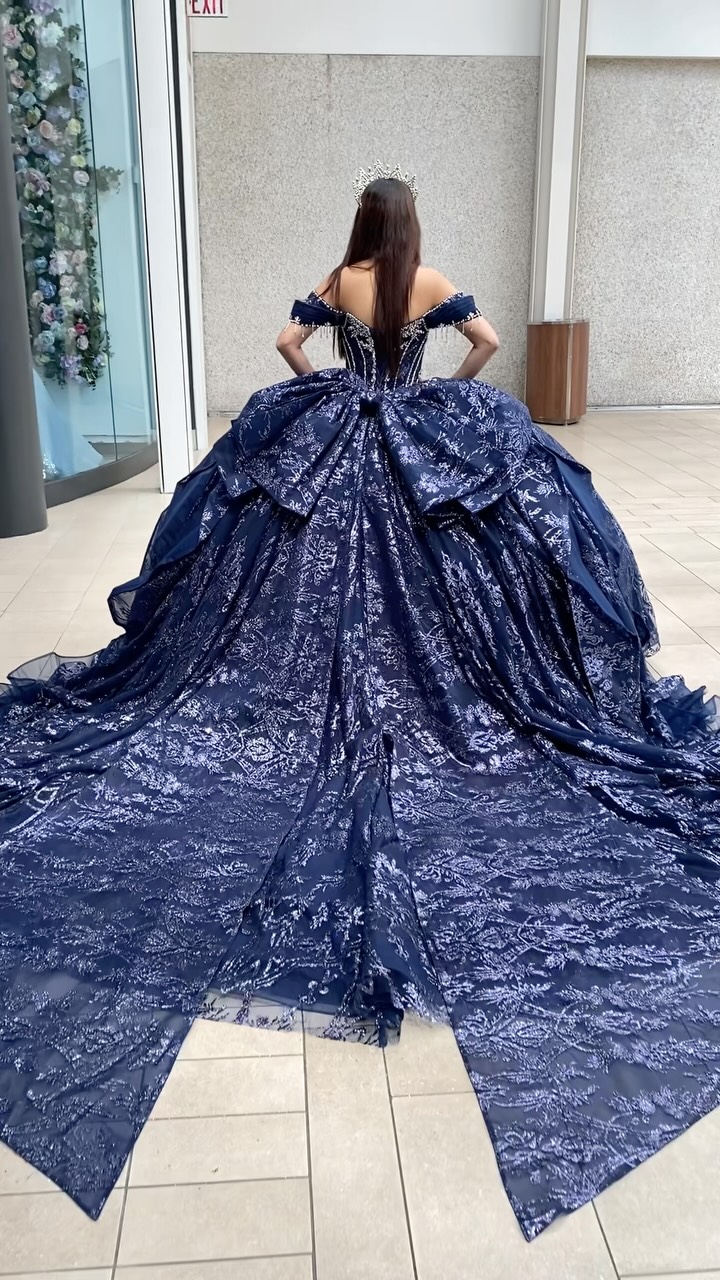 Navy Blue Quinceanera Dress with Crown at Princess Jewels in Fort Worth