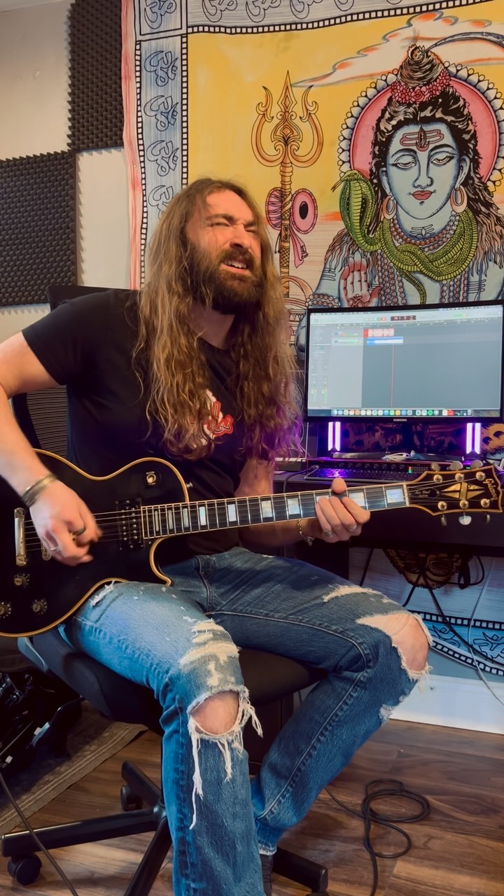 The amazing John Sykes with his black Les Paul Custom.