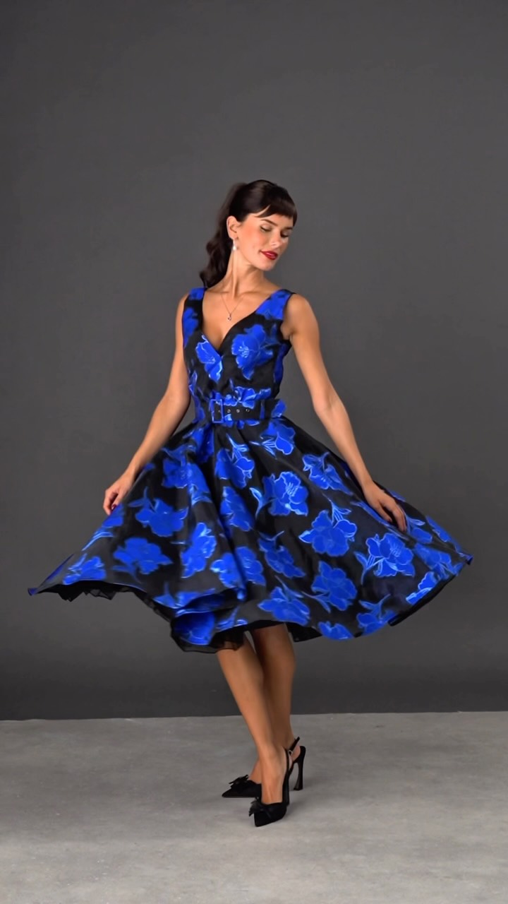 Old Hollywood glamour, new season Elegance., This is a reminder that you’re allowed to feel beautiful without a reason. Our Grace Kelly dress cut from an embroidered moonlight blue blooms on black 